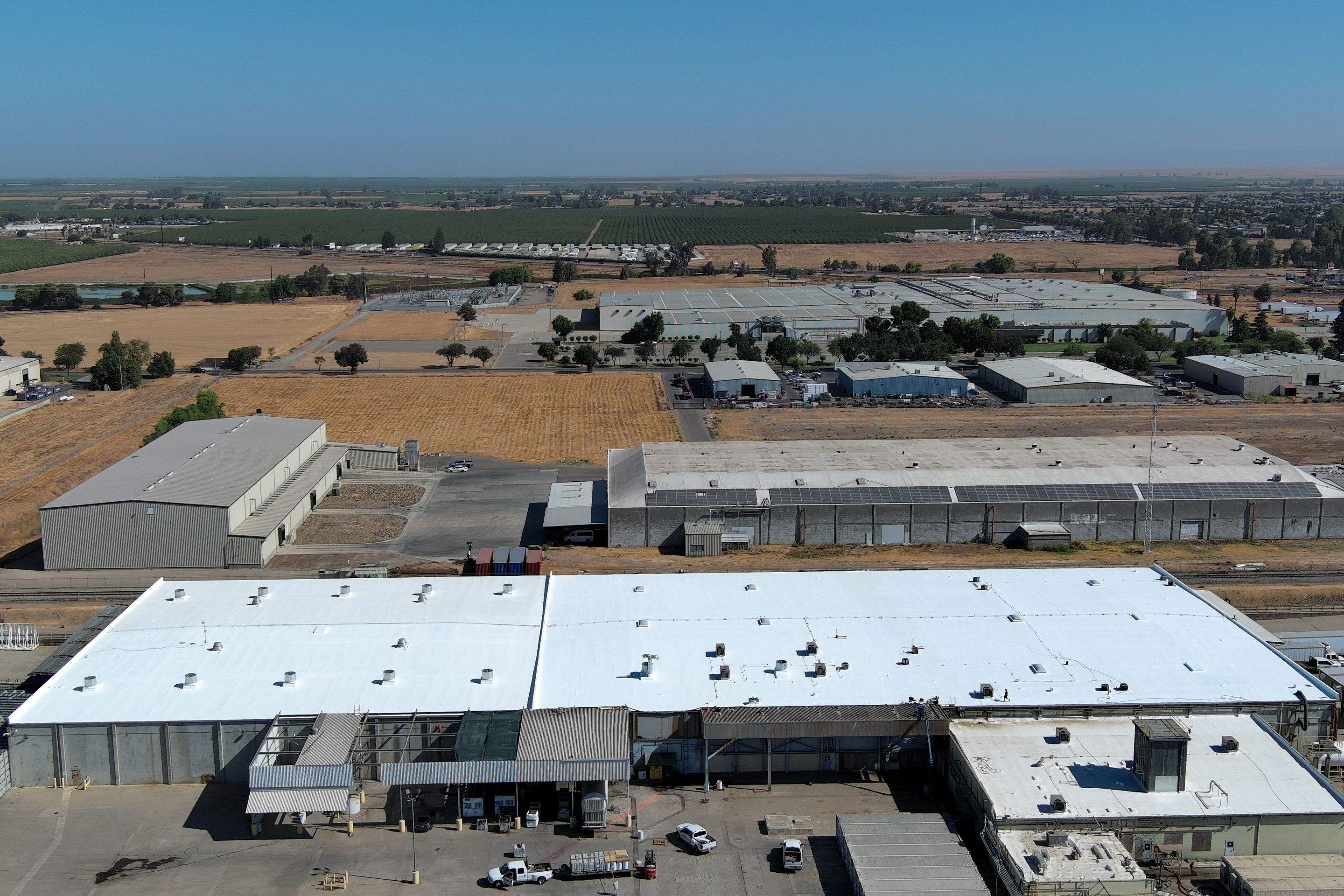 Pro Farms Spray foam roofing project by Straight Edge Roofing Inc