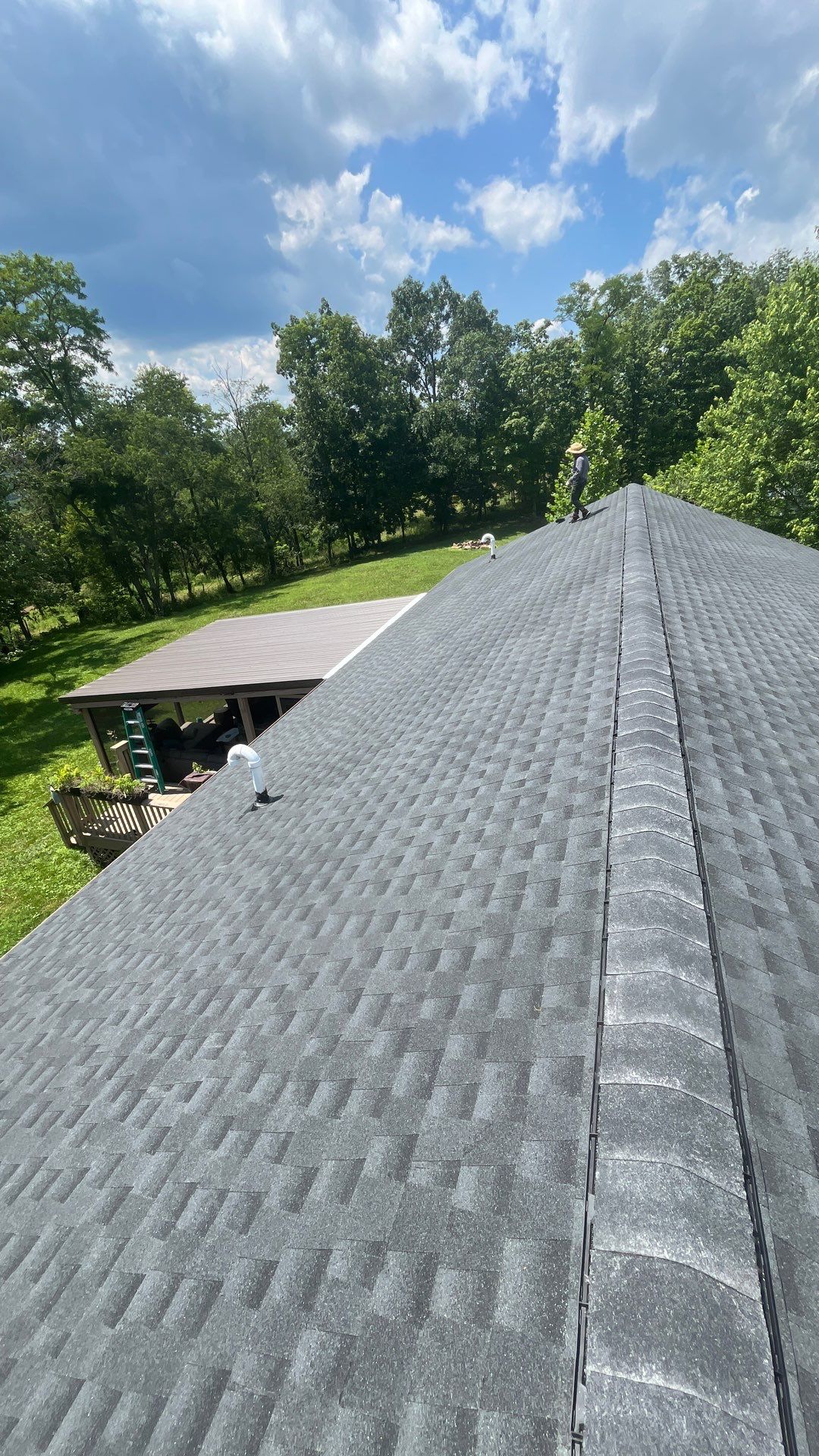 Residential Roofing Installation using GAF Timberline HDZ Charcoal by Rainstoppers Roofing