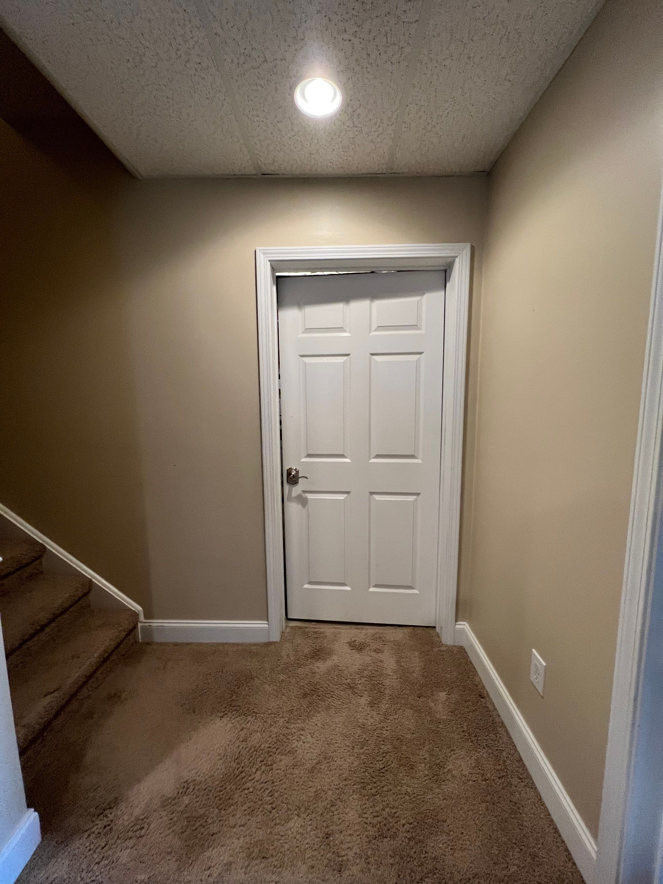 Modern Basement Remodeling in Woodstock with Custom Live-Edge Bar by Swift Home Renovations