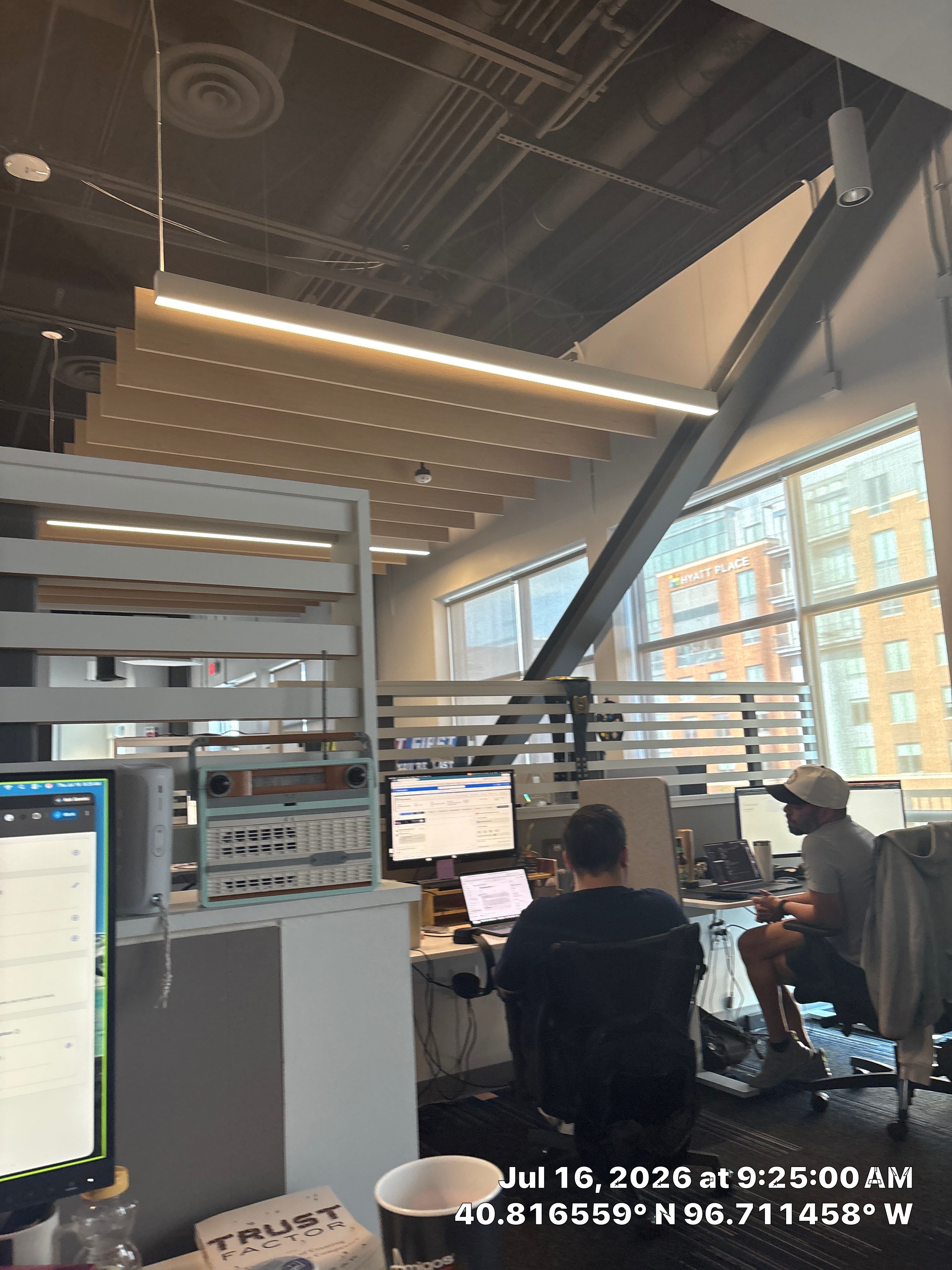 Modern Office Interior Renovation and Acoustic Baffles in Lincoln by CompanyCam Sales Demo