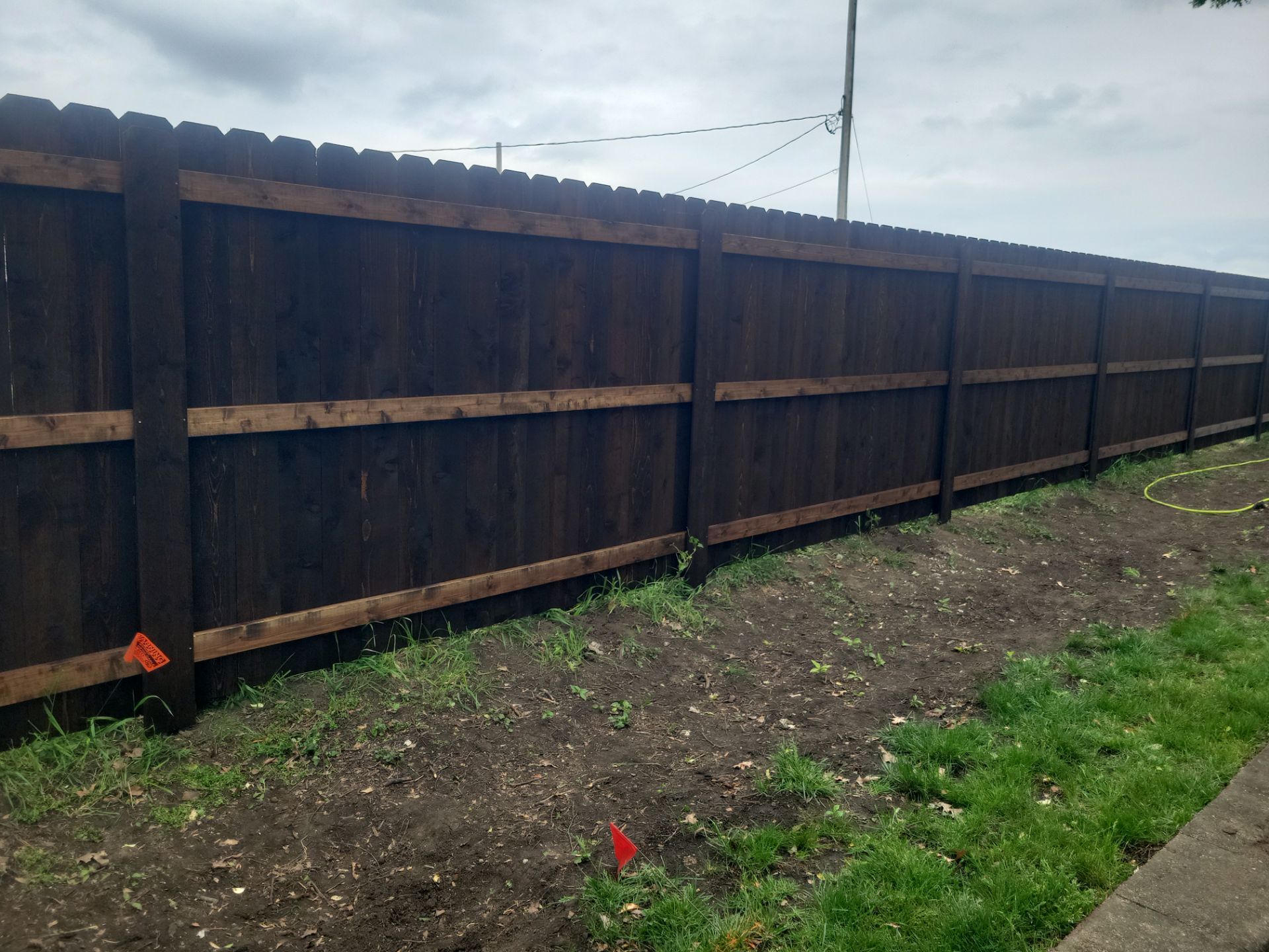 Chain Link and Cedar Privacy in Grundy Center by Perfect Picket Fence and Stain
