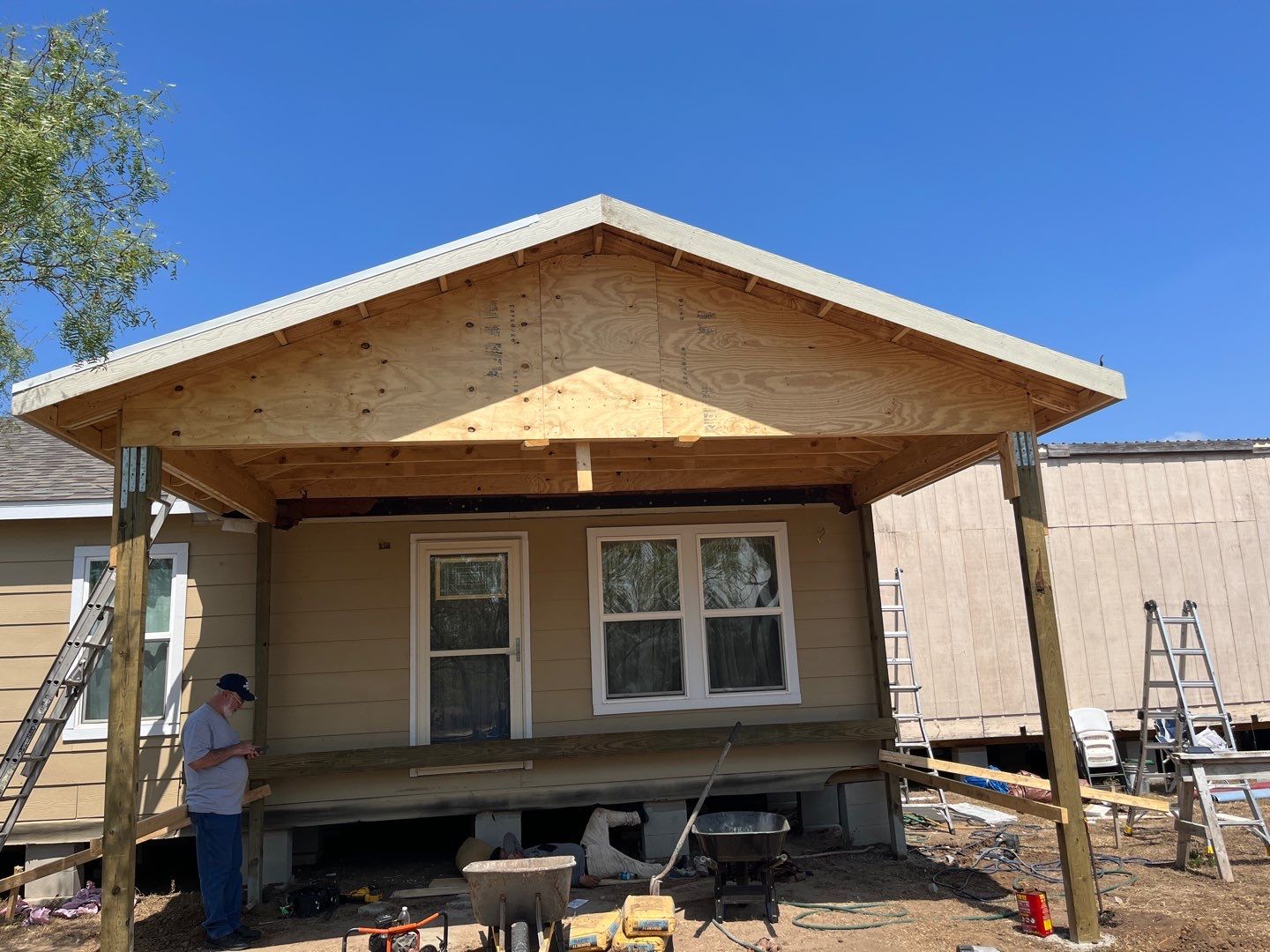 Front Porch Sitt'n by Bayfront Roofing and Construction