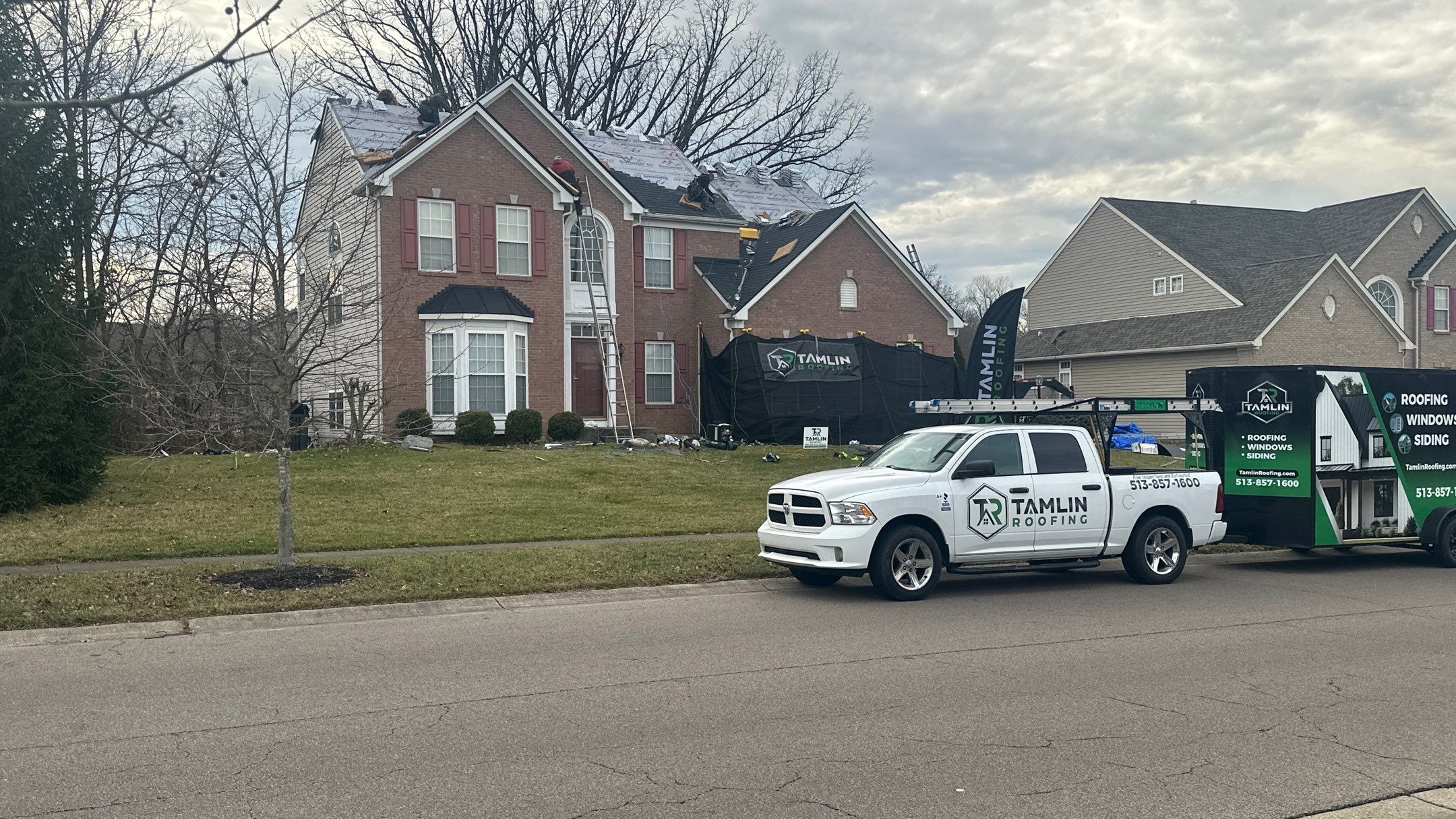 Walden Ponds - Pristine Black and Hydro Flo Gutter Guards by Tamlin Roofing