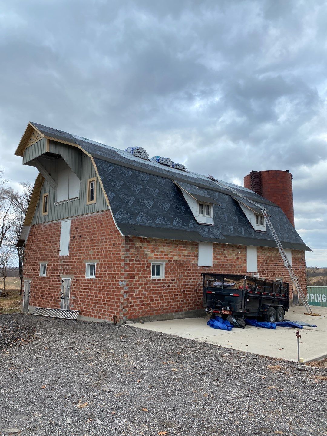 Roof Replacement with upgraded needed exhaust ventilation using Malarkey Vista Class III Impact Resistant Shingles in Black Oak color by Gorilla Exteriors Contracting, LLC