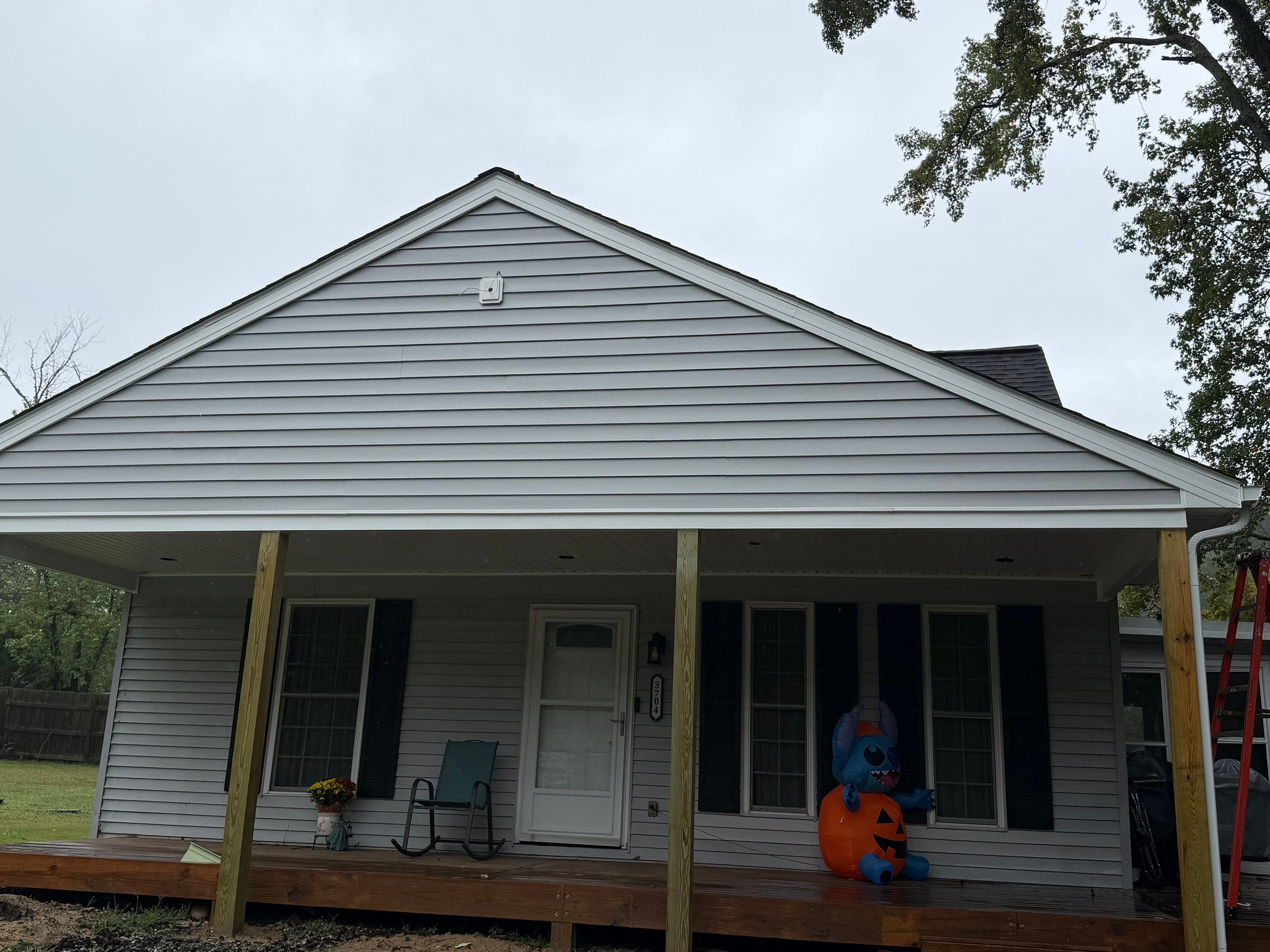 Asphalt Shingle Roof Replacement and Custom Porch Renovation in Hayes by Cade Construction