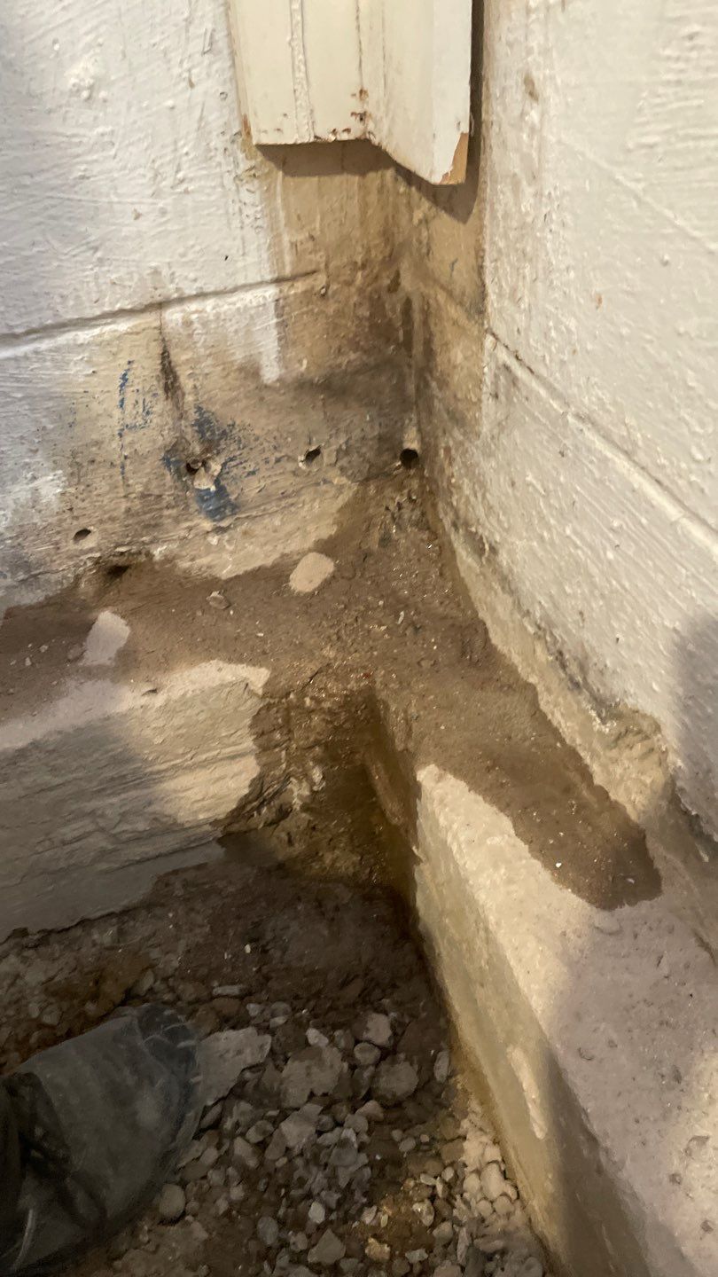 Interior Drain Tile & Buried Discharge in St. Anthony, MN by Waterproofing Northeast