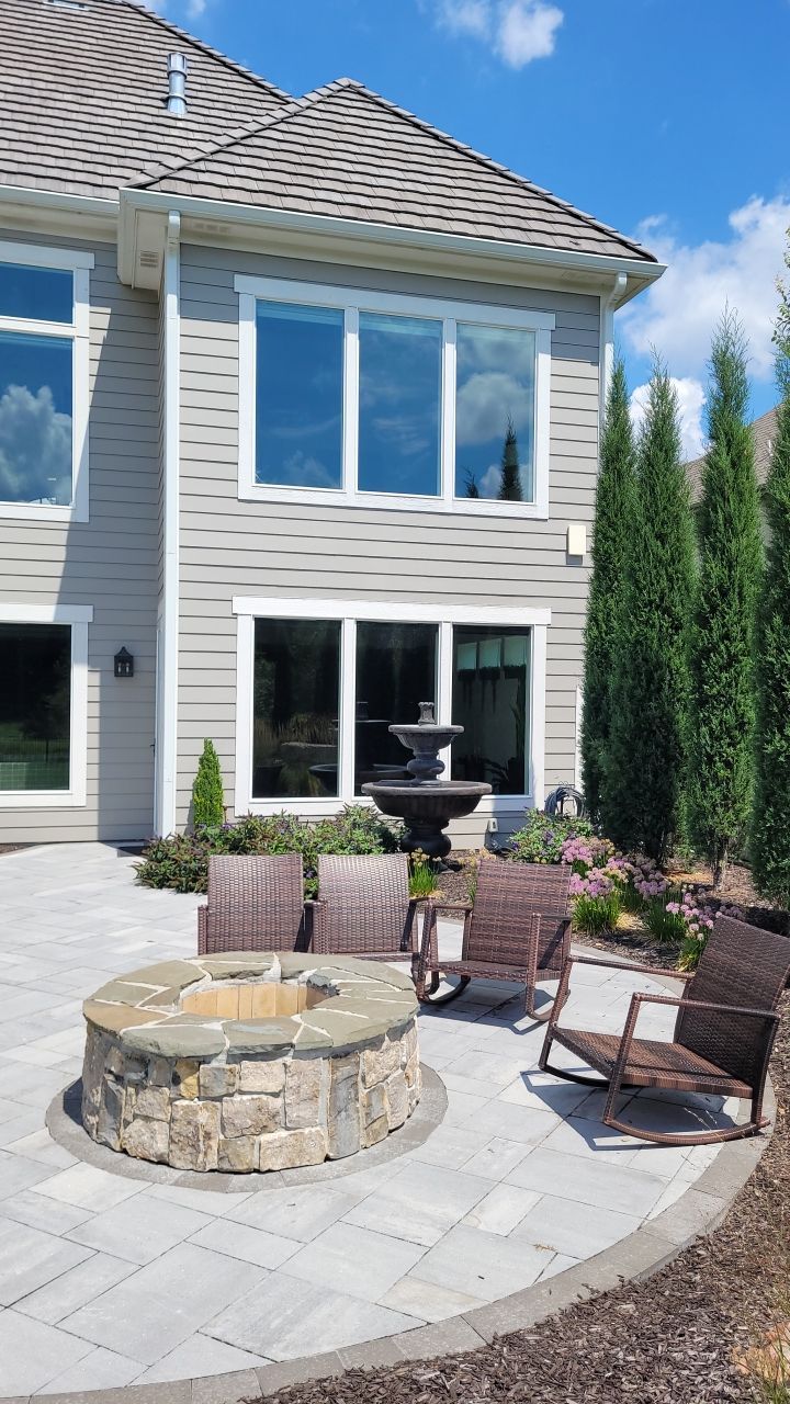 Front Yard Landscape and Walkway Renovation in Overland Park by LAND ESCAPES LLC