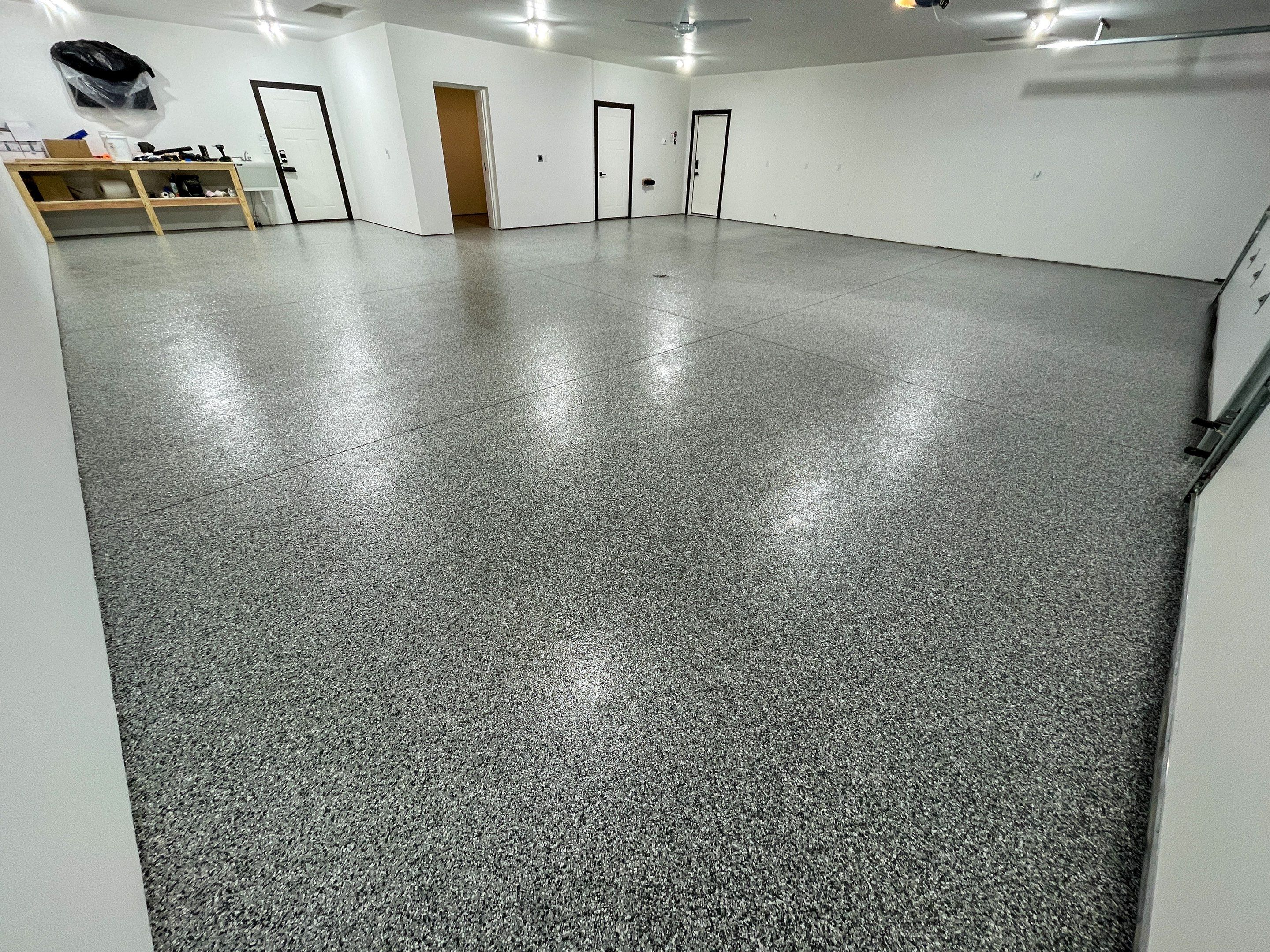 Garage using Slate Stone by Select Painting, Coatings & Garage Cabinets