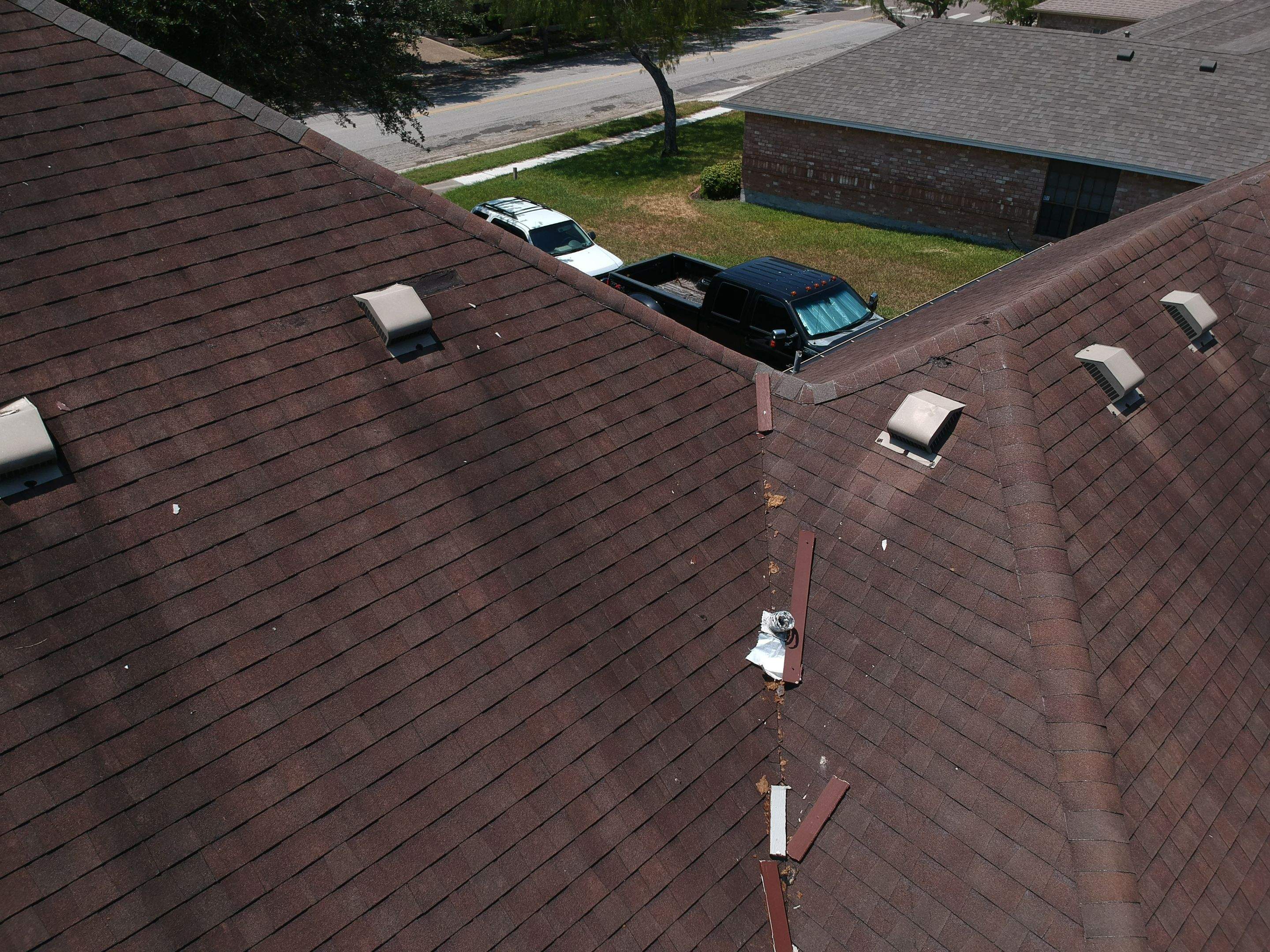Residential Roofing Installation using Certainteed Landmark Moire Black by Galvan Roofing and Construction