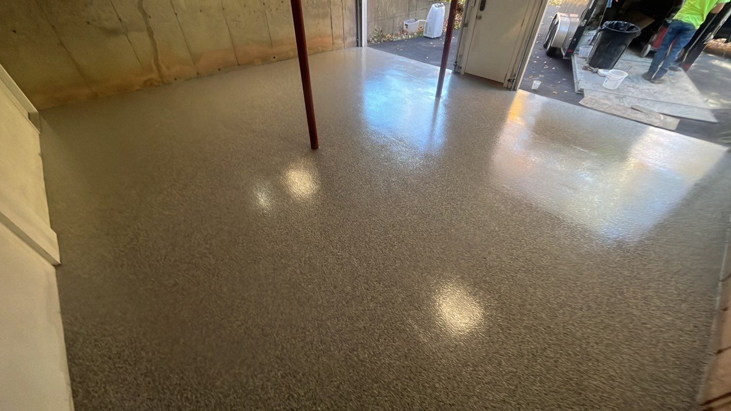 Garage in Londonderry, NH 03053 by Symphony Concrete Coatings