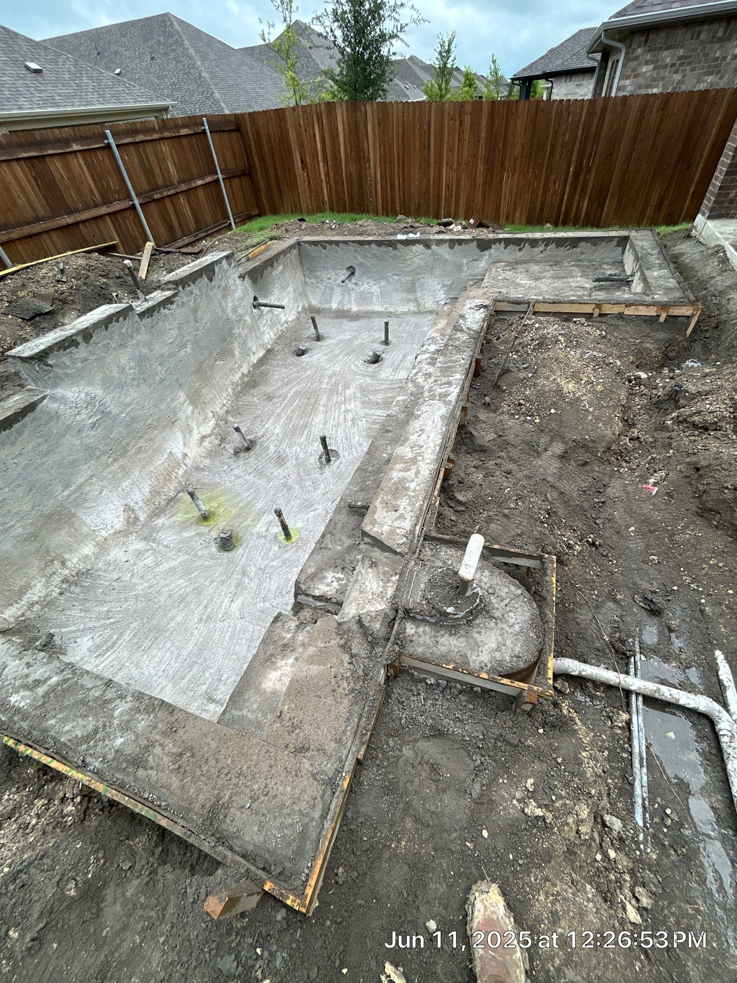 Sleek Geometric Pool with Tanning Ledge and Turf by Pinnacle Pools and Spas - DFW