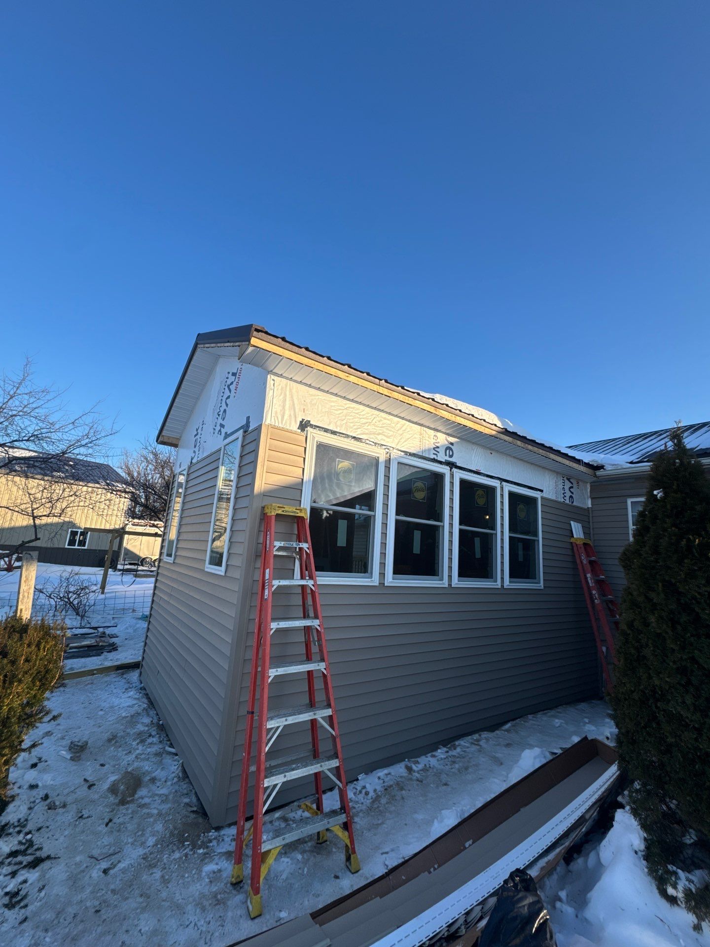 House addition and reroof by Horst Custom Homes 