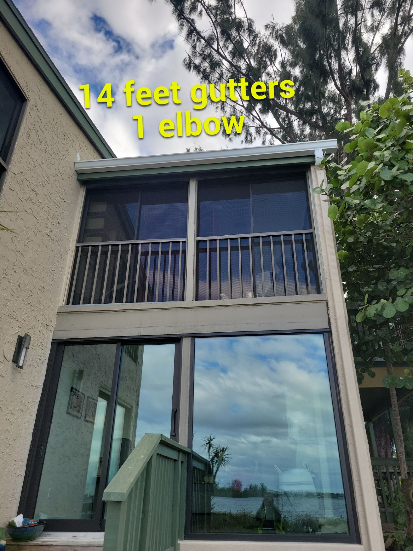 White Gutters Repair and Installation in Sarasota FL by Gutter Professors