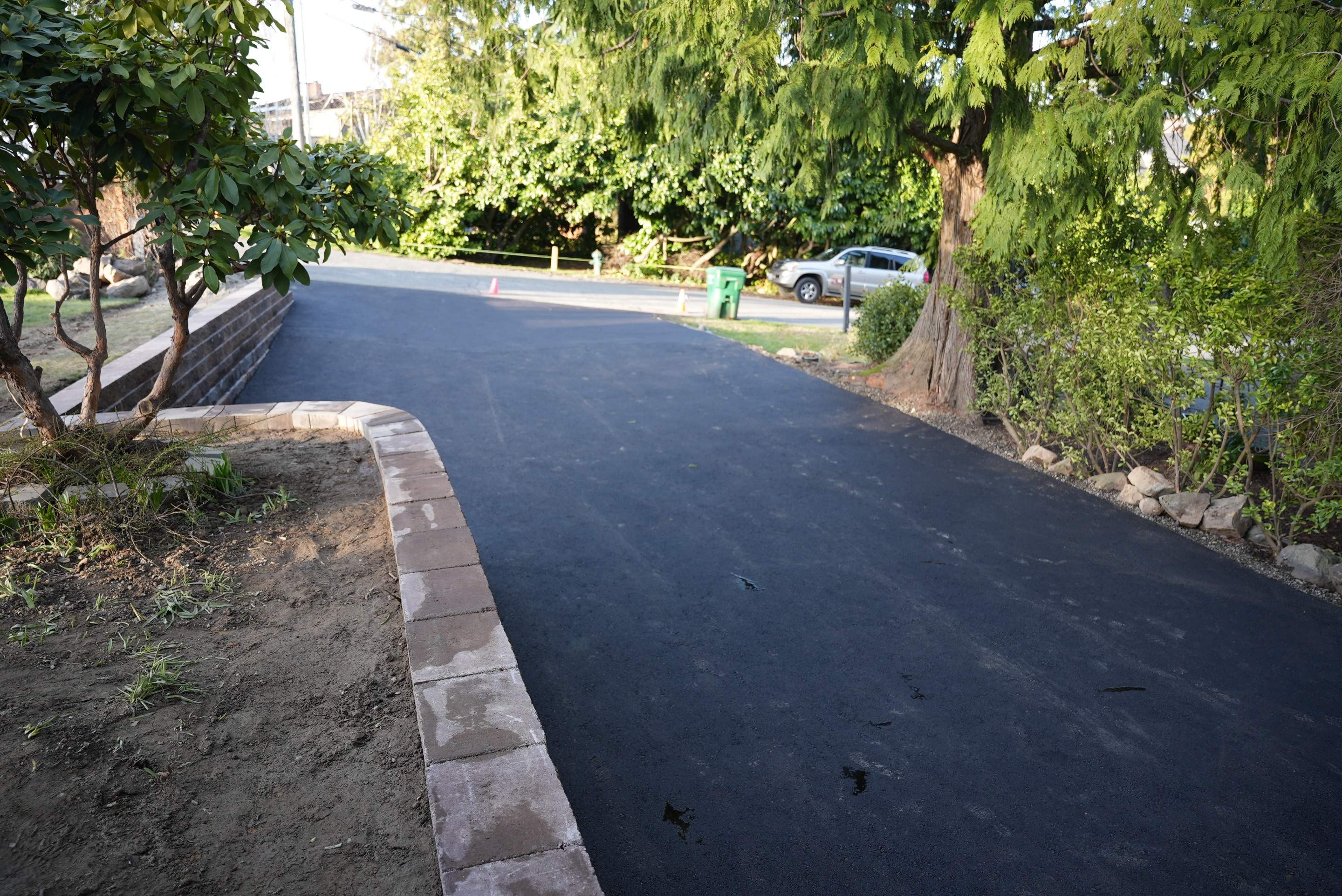 Lorra | Asphalt Driveway Repair & Retaining Wall by Jireh Asphalt & Concrete Inc 