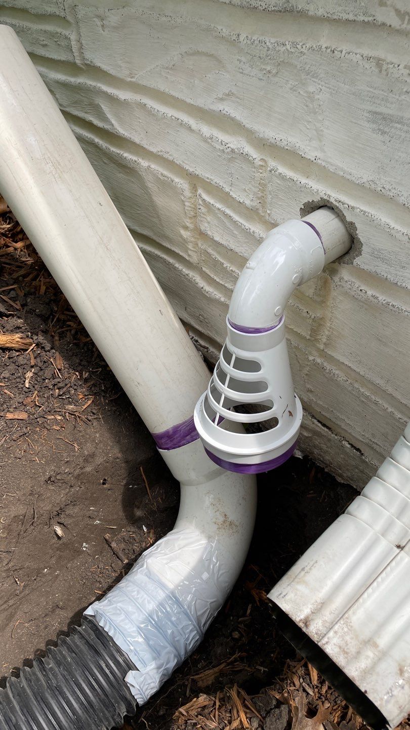 Drain Tile, Window Wells & Buried Discharge in Minneapolis by Waterproofing Northeast