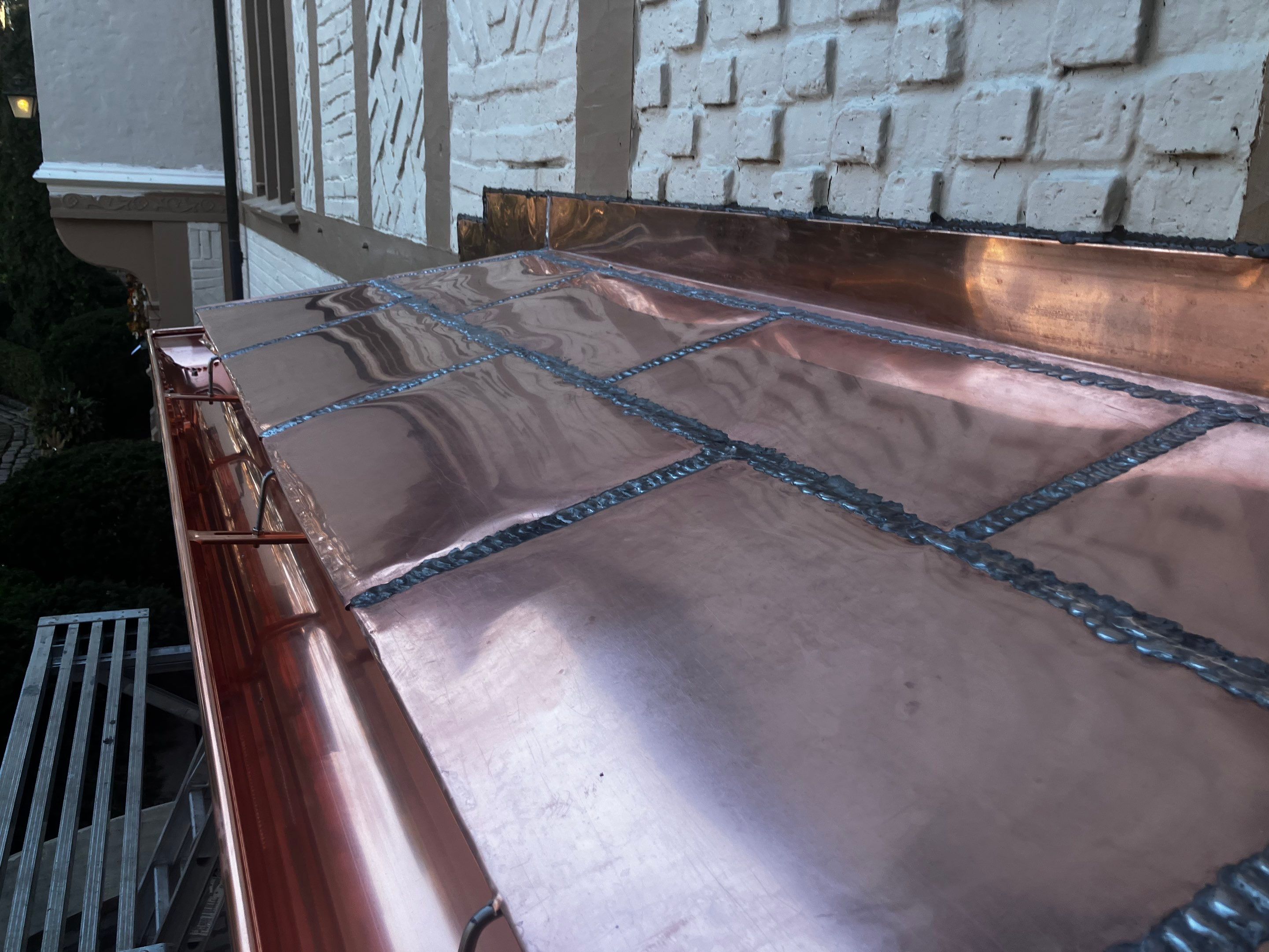 Ludowici Roof Installment and Half Round Copper Gutter Replacement  by Custom Installations
