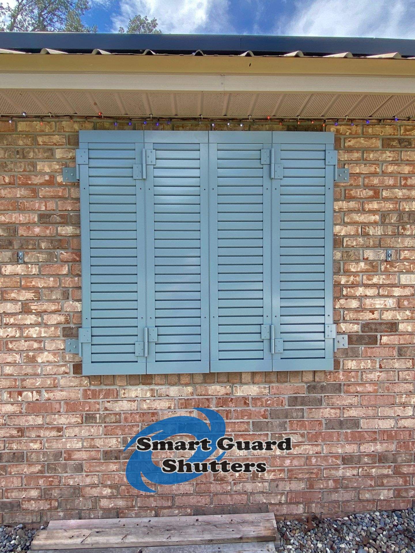 Impact Colonial Shutters in Squirrel Grey by Smart Guard Shutters