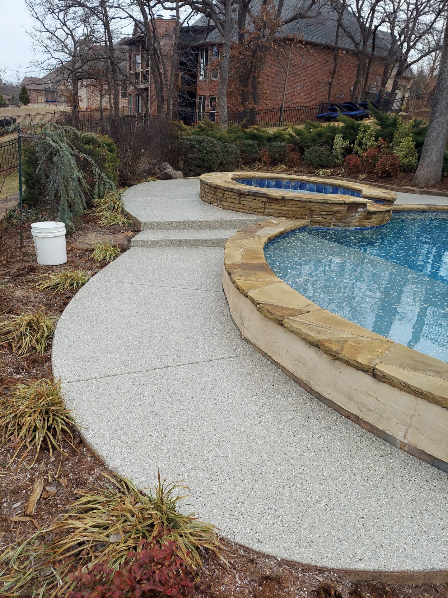Pool Deck Install with Pebble Beach by Copperhead Coatings