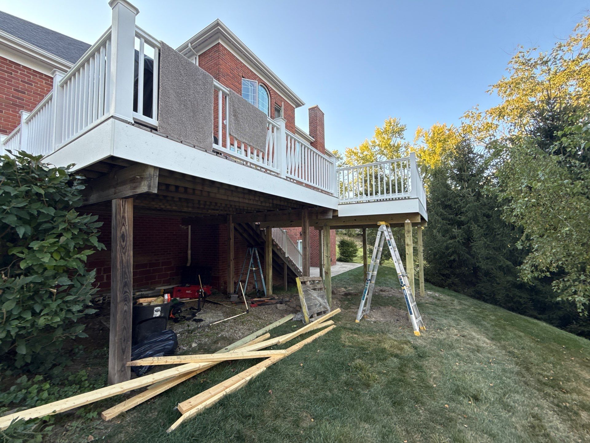 Deck extension  by Cousins Roofing Siding & Decks