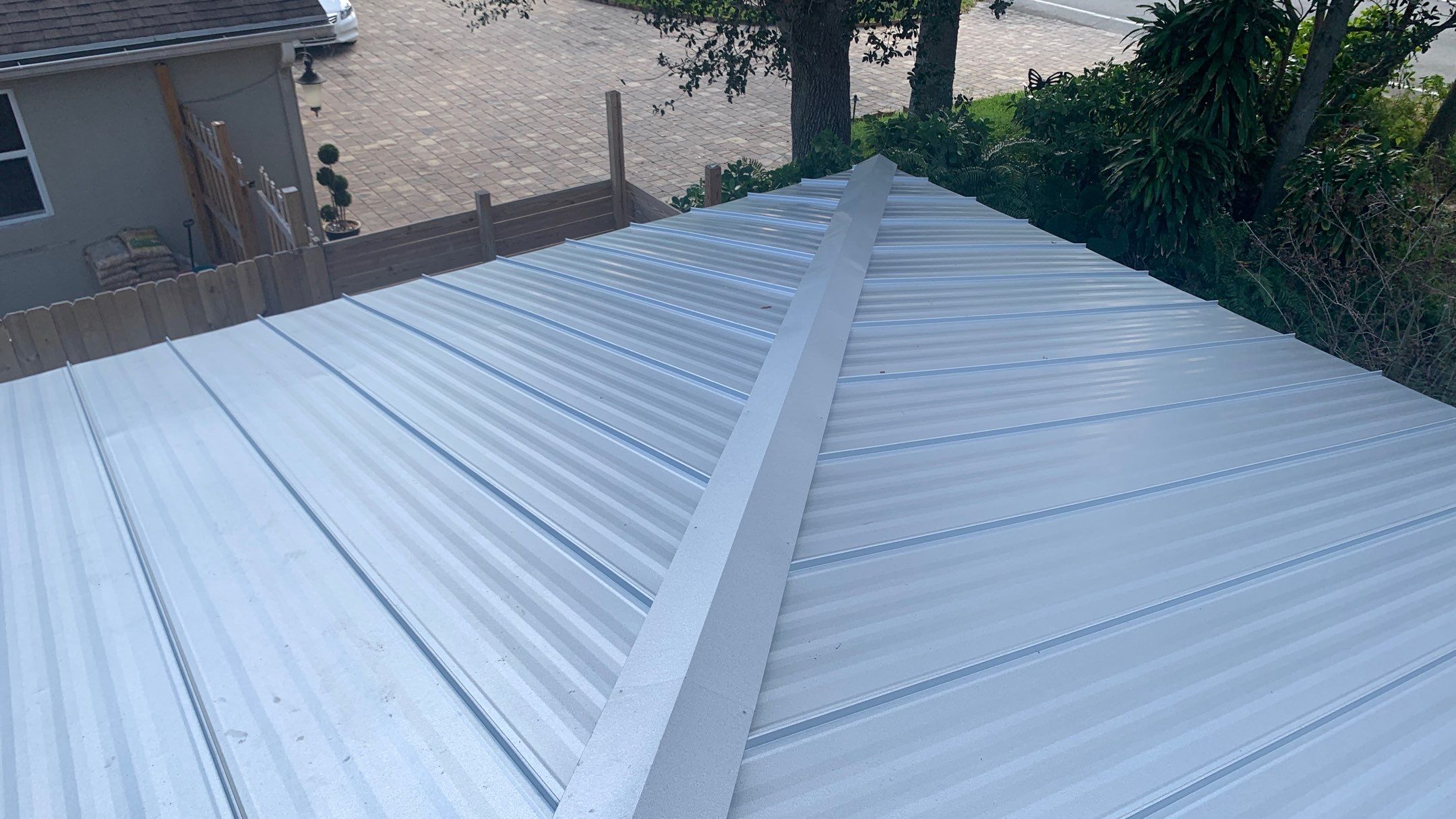 Residential Roofing Installation using 1" Nail strip metal roof by BLUES BROTHERS ROOFING