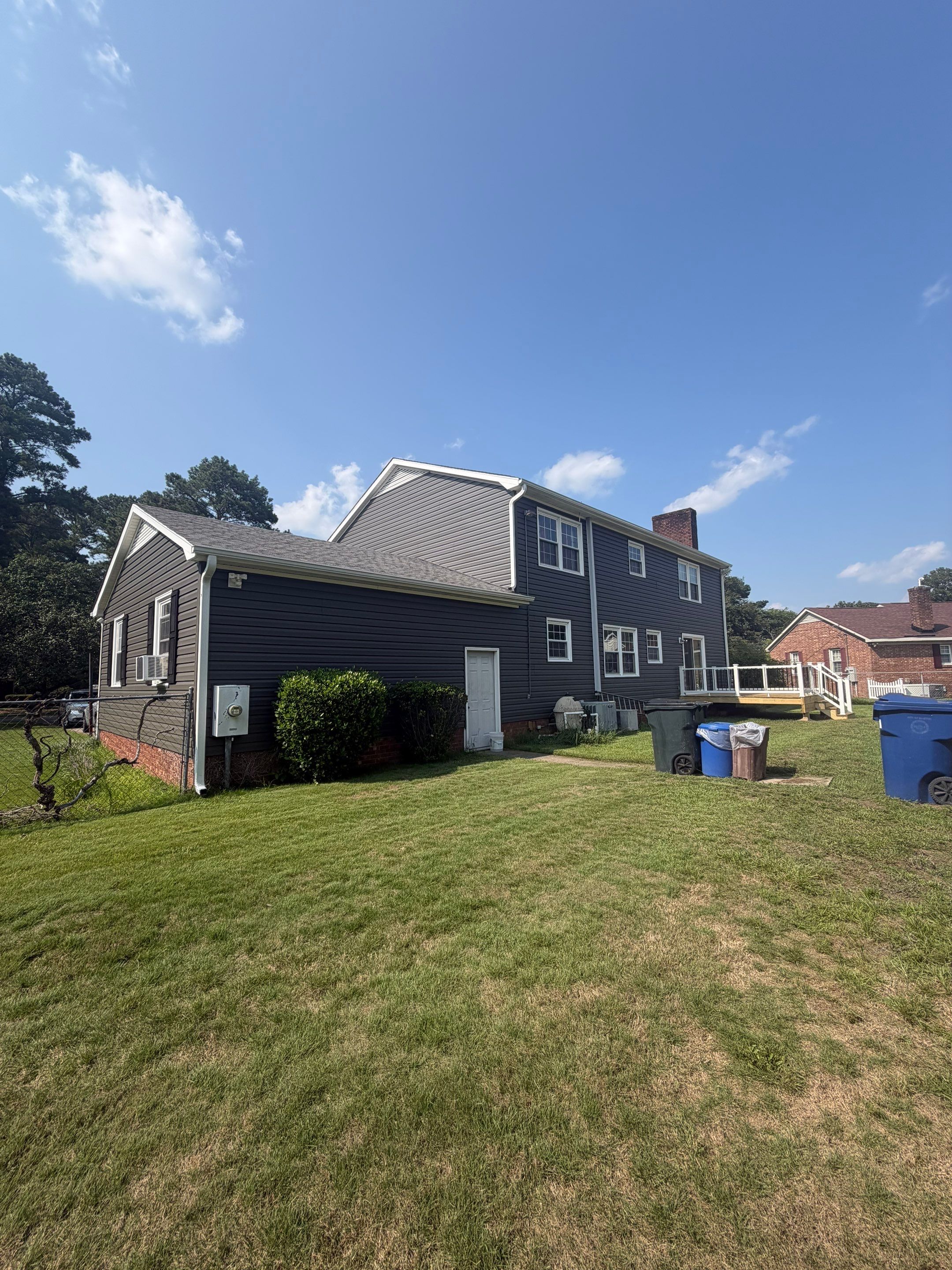 Dark Gray Siding and Custom Deck Installation in Kinston by The Remodeling Company