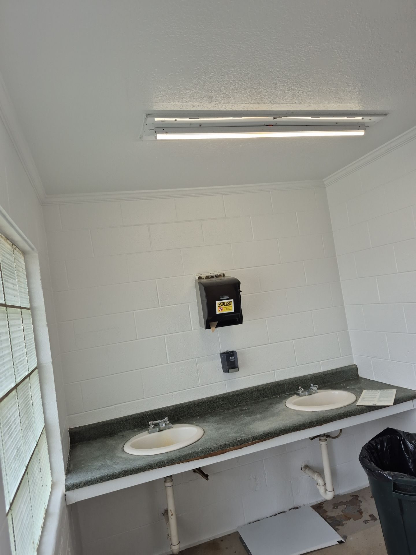 Bathroom Repaint & Epoxy Floor coating by Gordon Painting