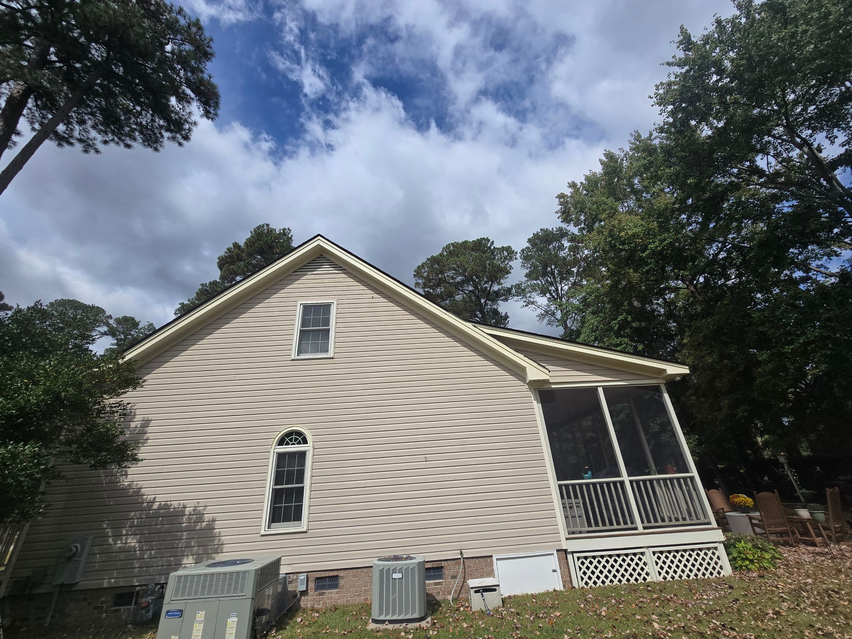 Arched and Double-Hung Window Replacement with Custom Trim in Wilson by The Remodeling Company