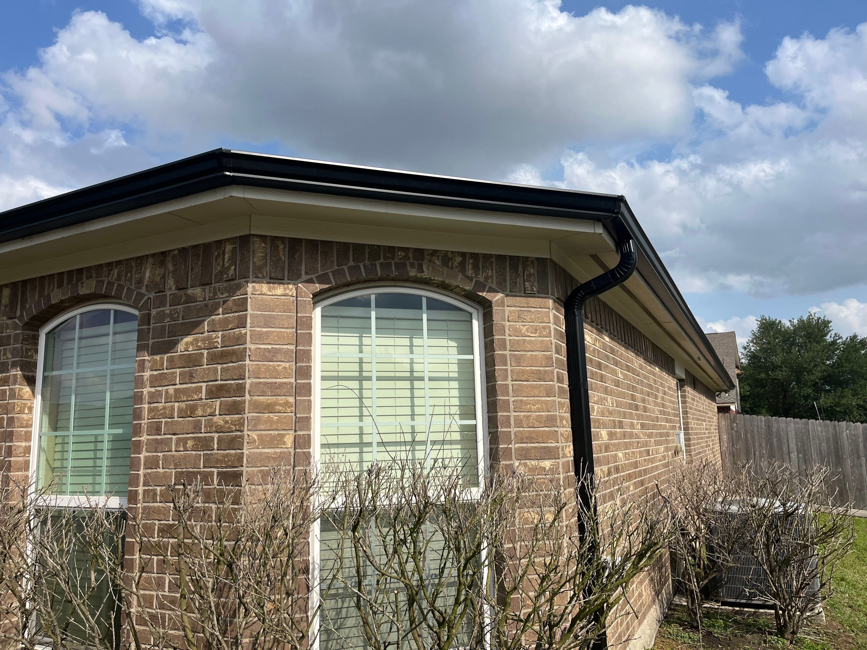 Reroof and Gutter Project in Houston by Roofing Technologies Unlimited
