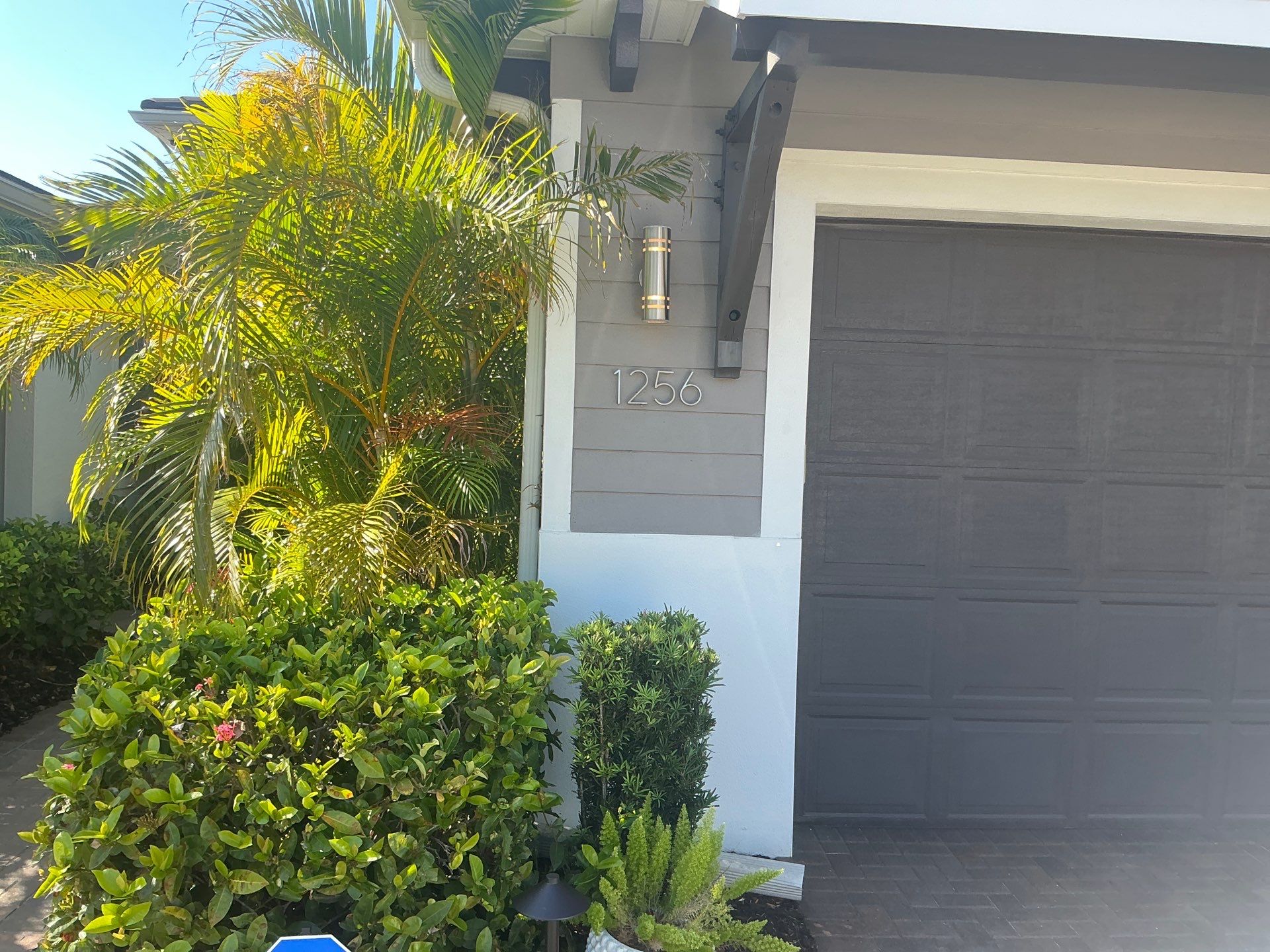 White Seamless Gutters with Downspouts in Bradenton FL by Gutter Professors