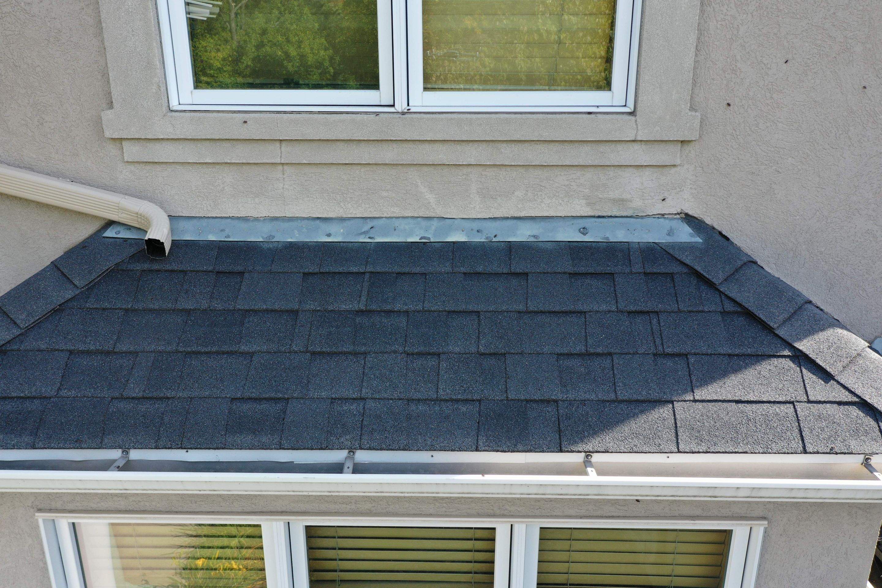 Residential Roofing Installation using Certainteed Landmark Moire Black by MODERN EXTERIOR SYSTEMS