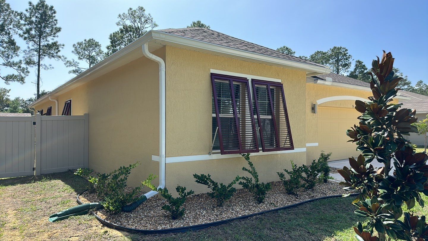 Hurricane Rated Bahama Shutters in Wine Red by Smart Guard Shutters