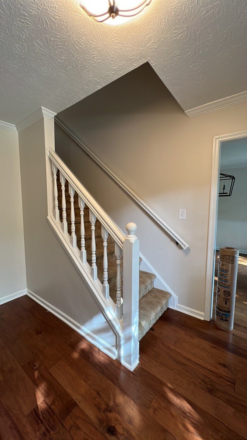 Dark Hardwood Floor Installation and Interior Painting in Marietta by Swift Home Renovations
