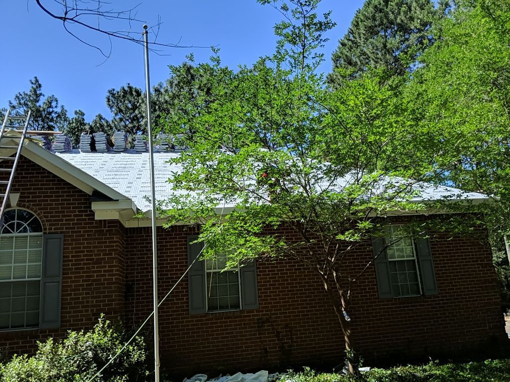 Residential Roofing Installation using Roof Replacement by American Roofing & Construction LLC
