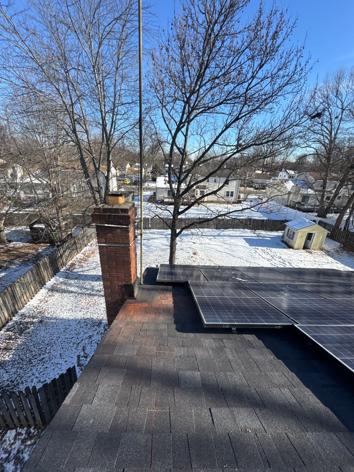 Onyx Black Shingles by Reimagine Roofing