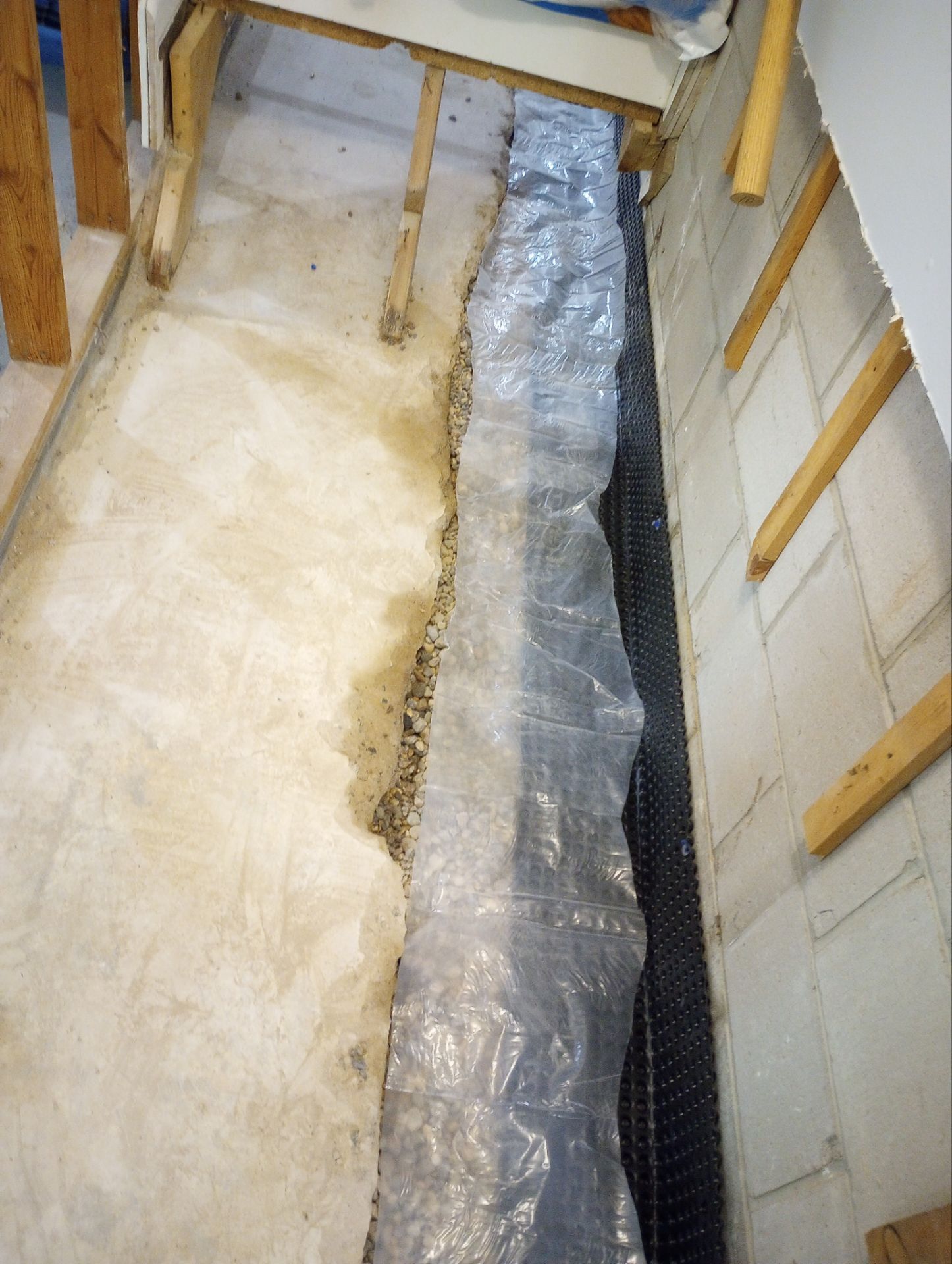 Correcting an Improper Installation for Alan in Chanhassen by Waterproofing Northeast