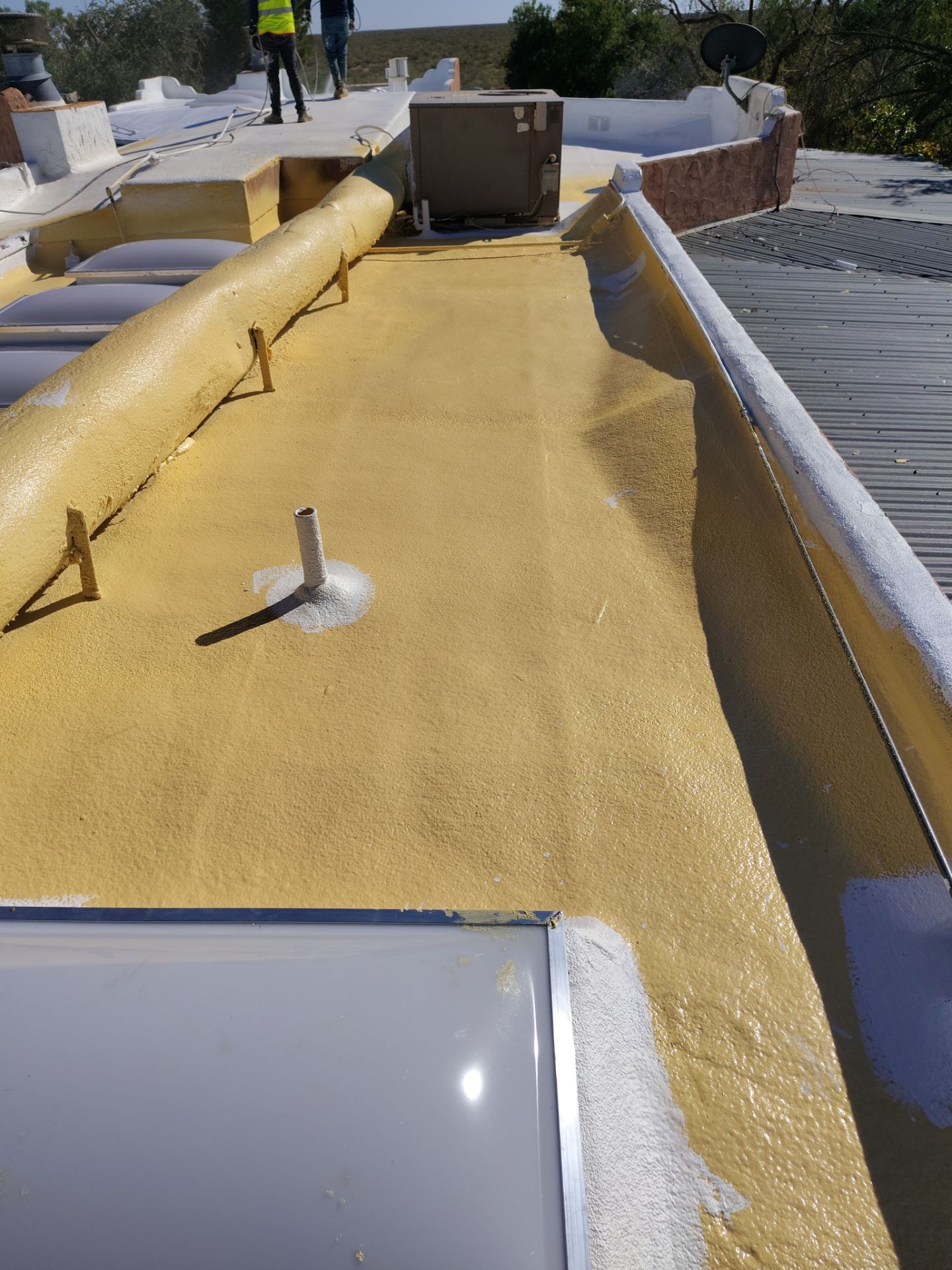 Residential roof application by SPF Services 