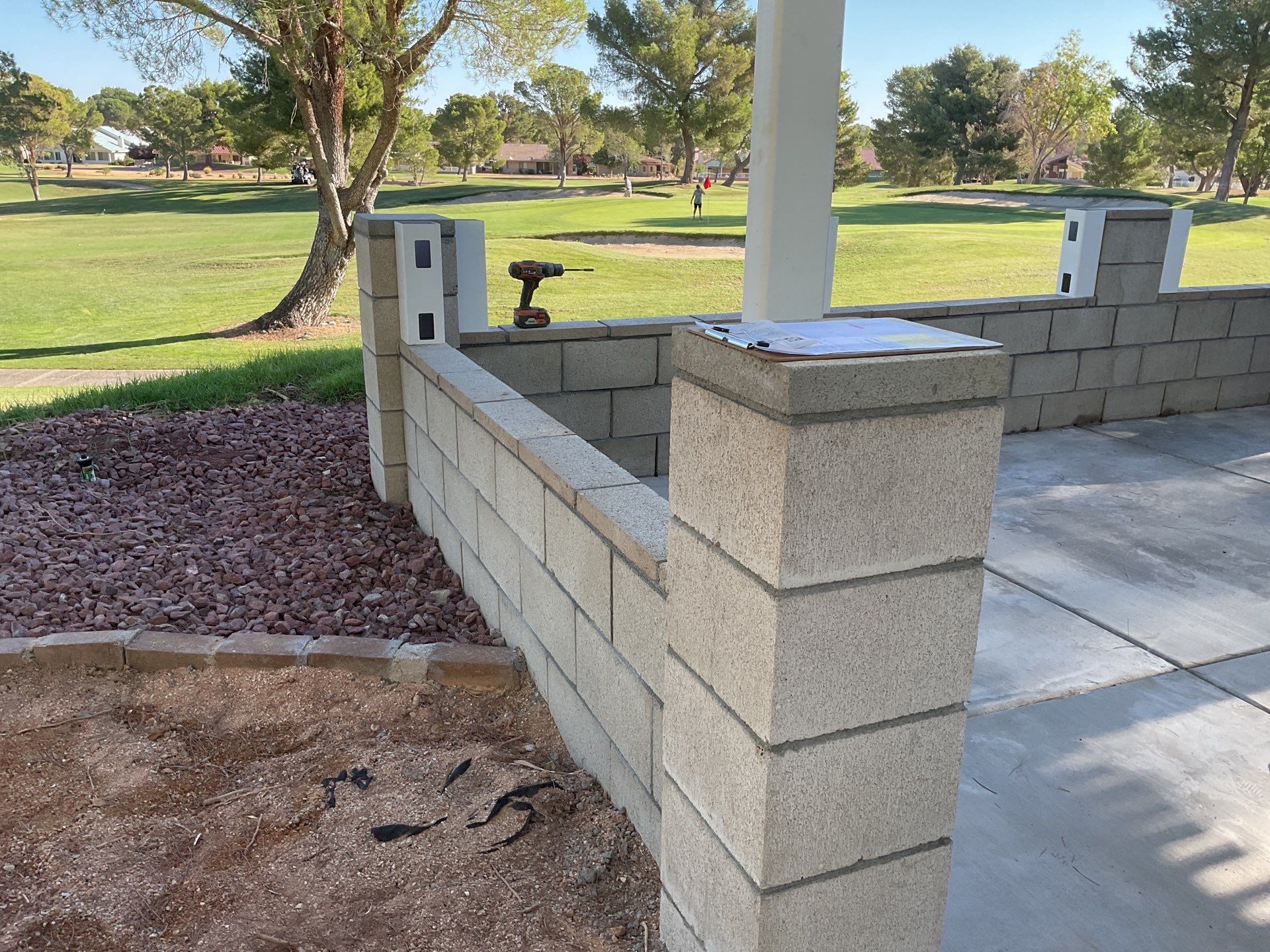 White Box Picket Fence on top of block wall  by Fence Guys Inc. 