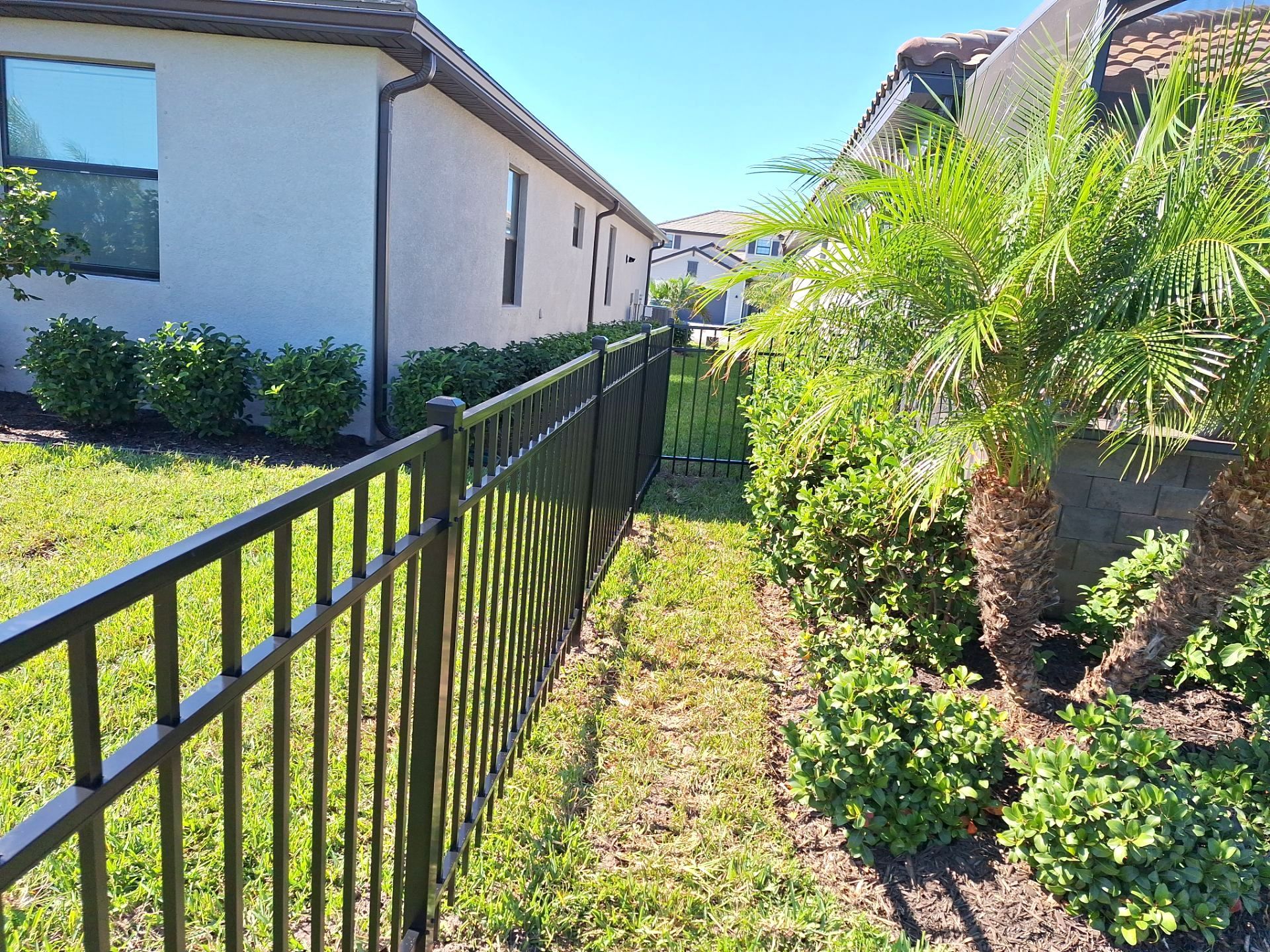 Aluminum Fence Installation using 4ft 3 Rail Black Aluminum Fence by Asap fence and gates, LLC