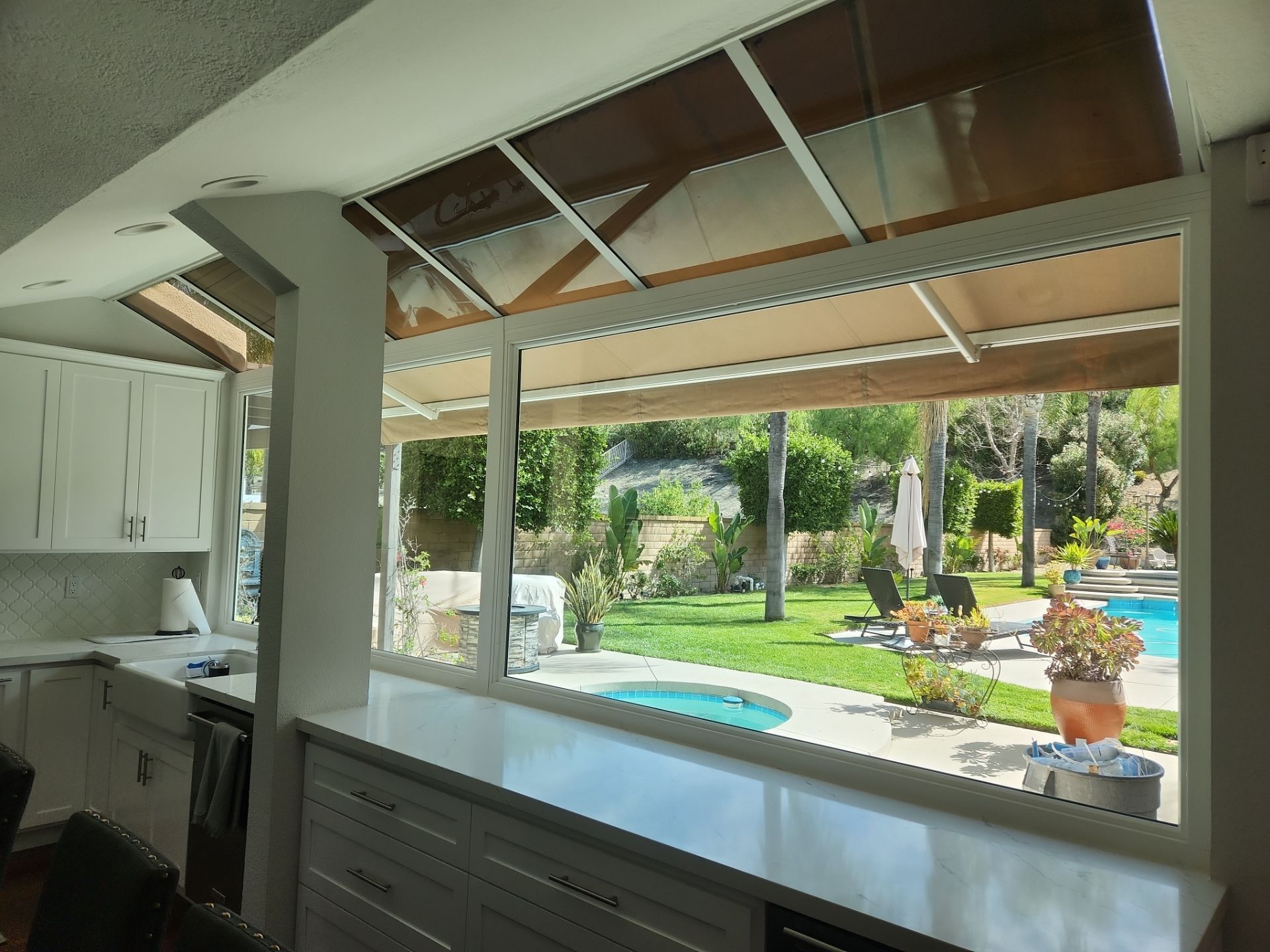 Window Installation using Anlin vinyl windows with Sunshield glass by American Window Company