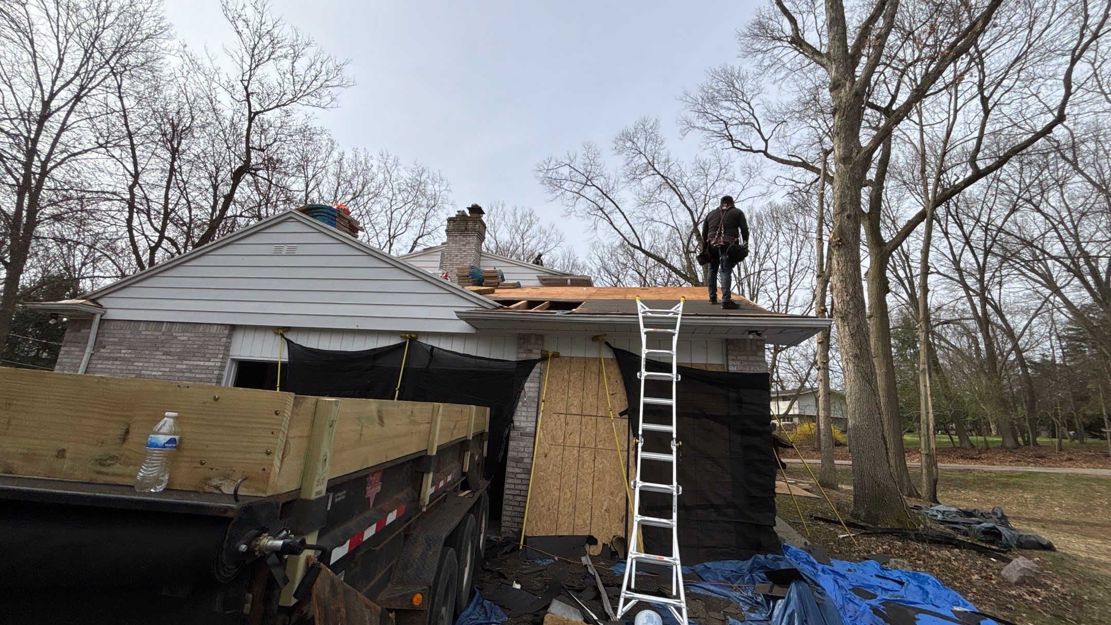 Roof Replacement using CertainTeed Landmark Moire Black by 180 Contractors