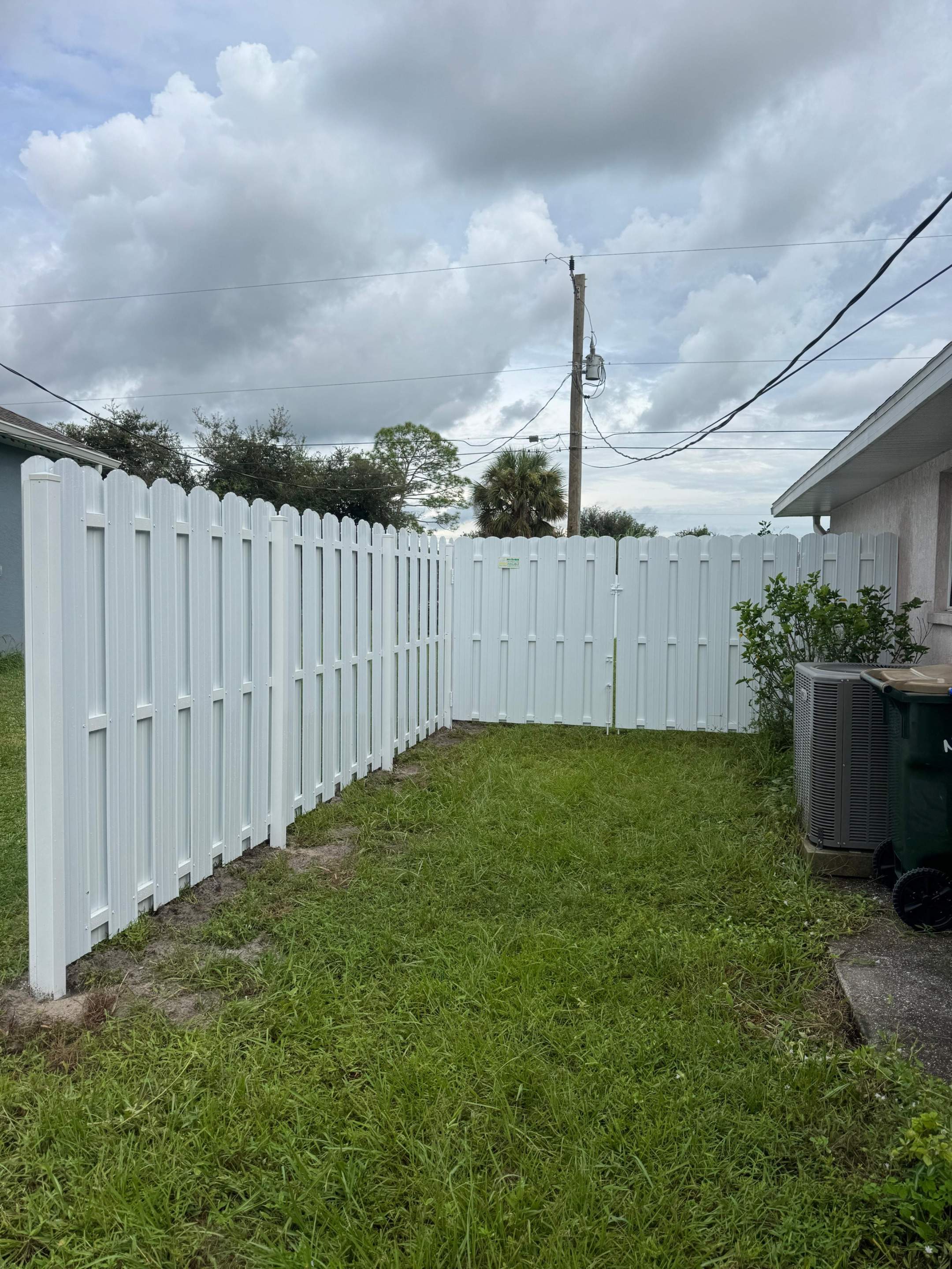White Vinyl Privacy Fence Installation in North Port by True Fence LLC