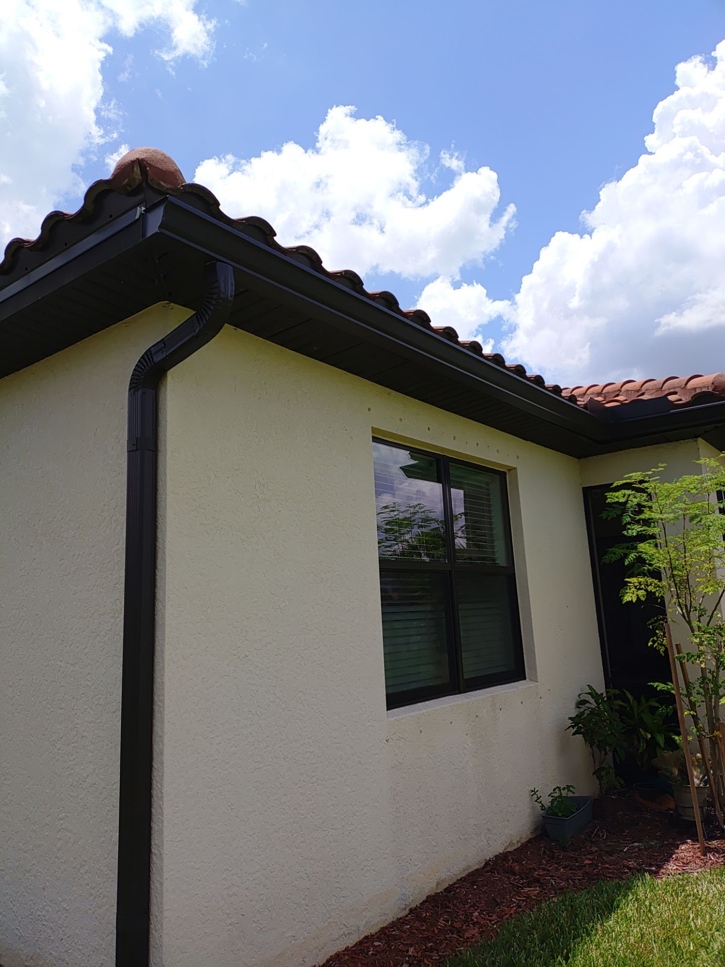 Black 6-Inch Seamless Gutters in Fort Myers FL by Gutter Professor by Gutter Professors