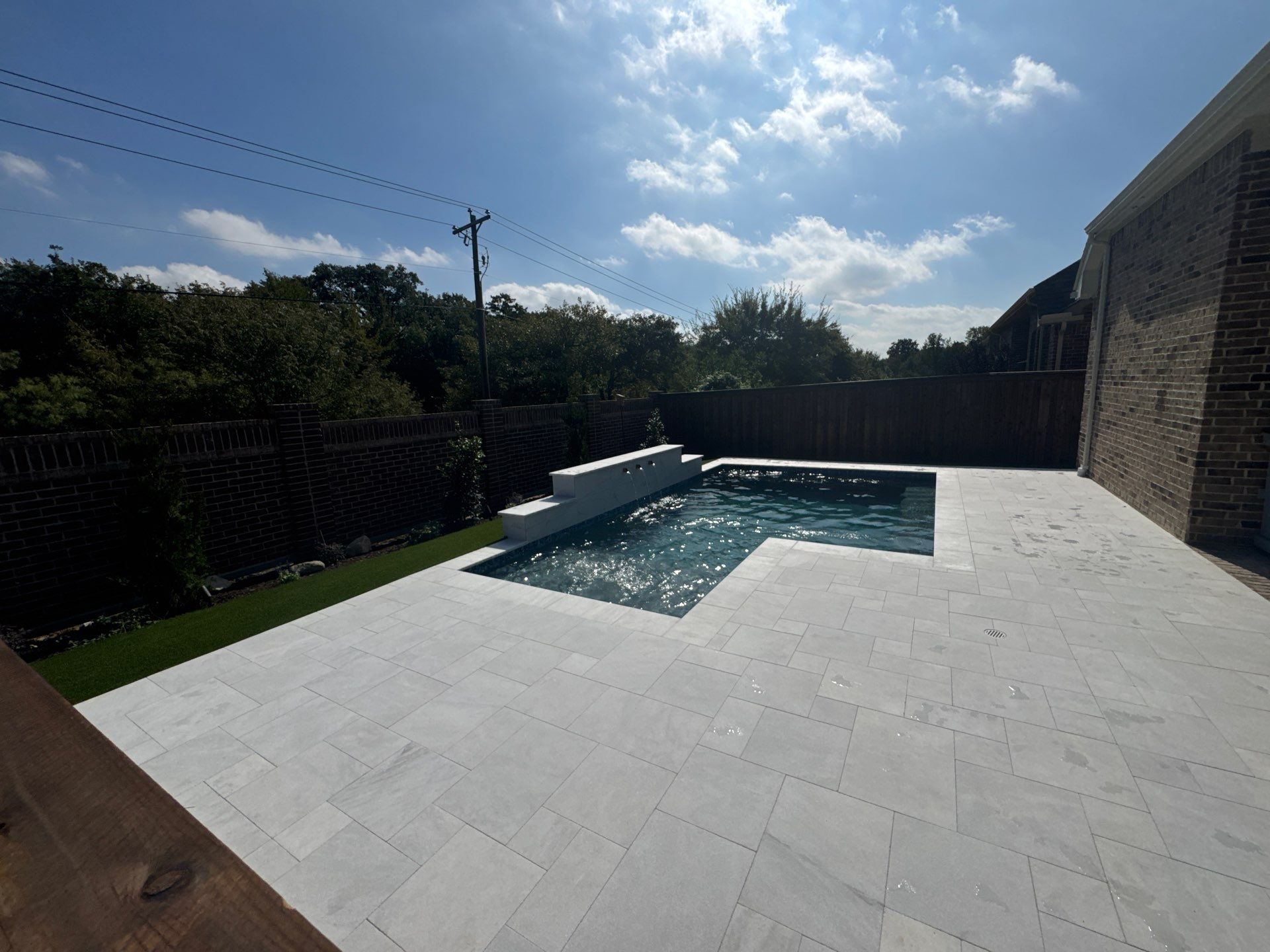 Modern Geometric Pool with Turf Surround by Pinnacle Pools and Spas - DFW