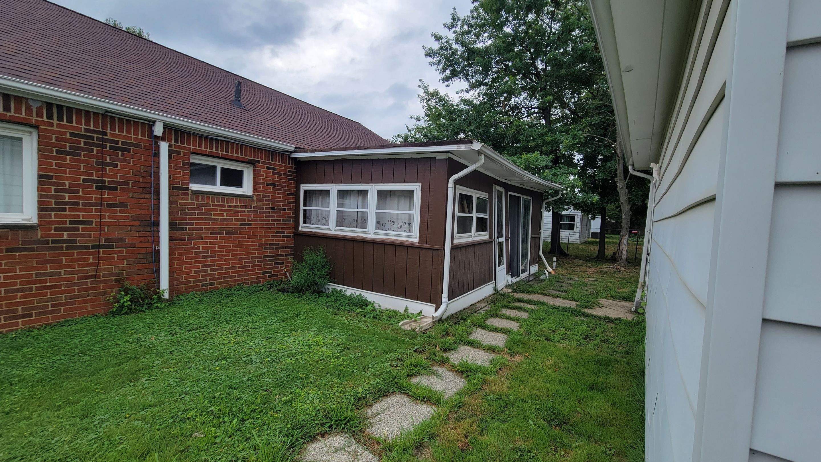 Tree Destroyed Patio Room by Absolute Roofing and Construction