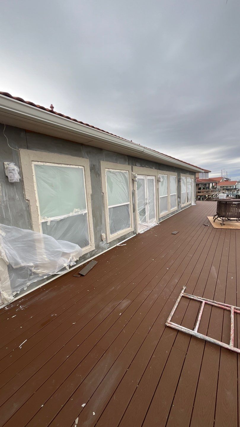 Waterfront Walkout Waterproofed! by Bayfront Roofing and Construction