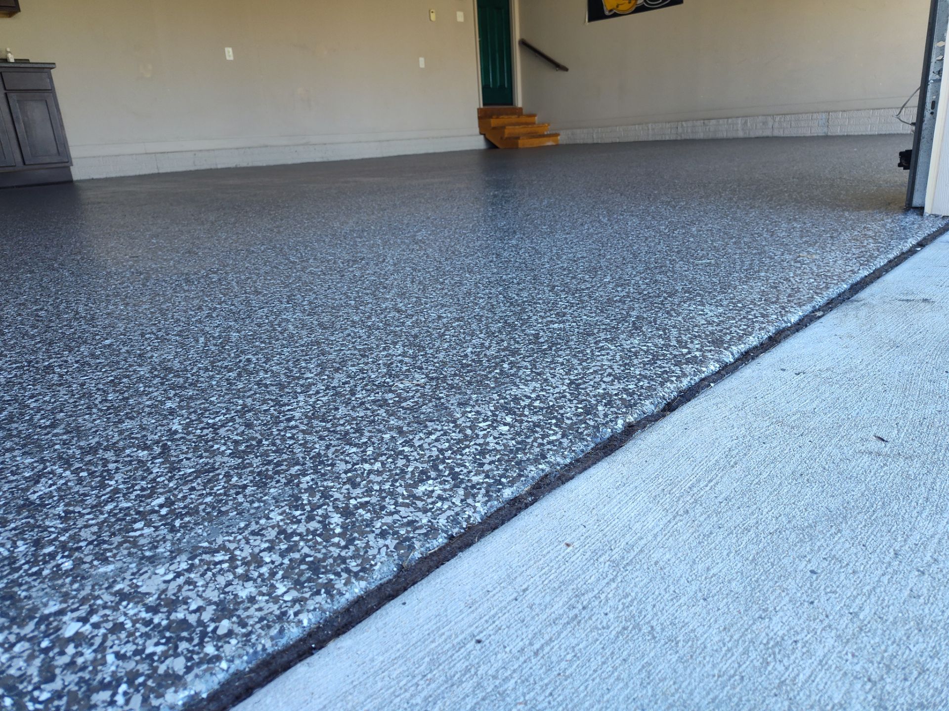 Another Garage Protected from Rock Salt & Chemicals by Revival Concrete Coatings, LLC