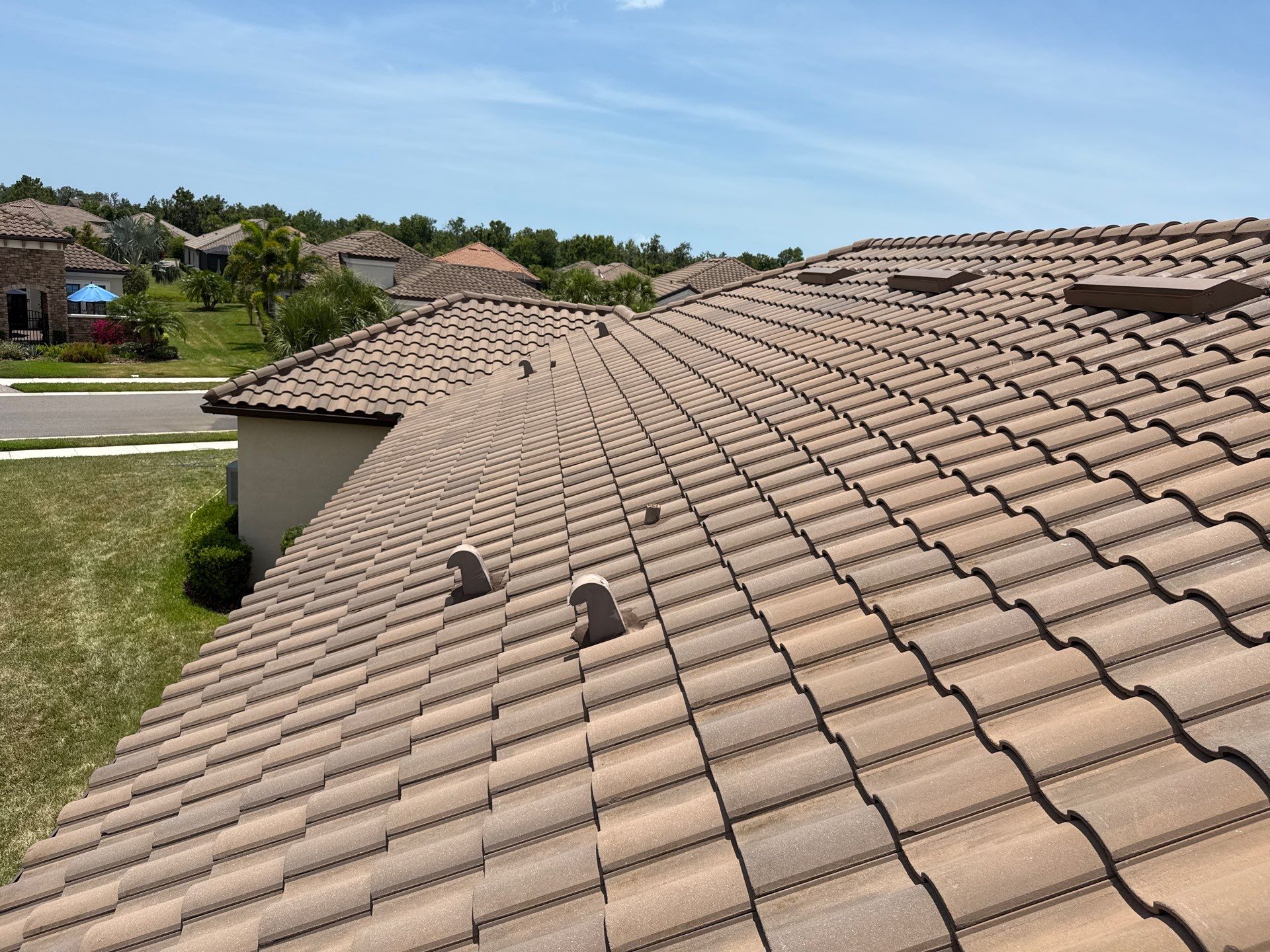 Concrete Tile Roof, Paver Driveway & Lanai Cleaning – Artisan Lakes Esplanade, Palmetto, FL by Sunshine AquaWash