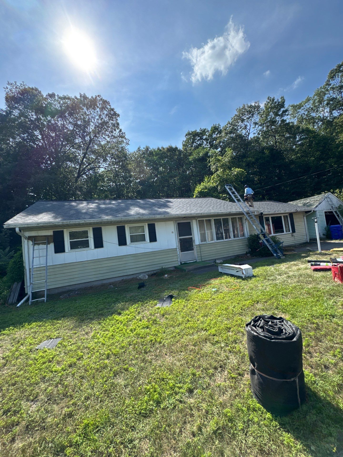 Onyx Black Roof Transformation in Maynard, MA by Mighty Dog Roofing of Greater Middlesex County