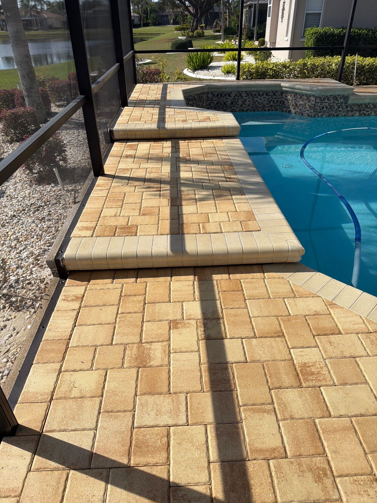 Custom Tan Paver Pool Deck and Patio in Sun City Center by Supreme Paver Experts