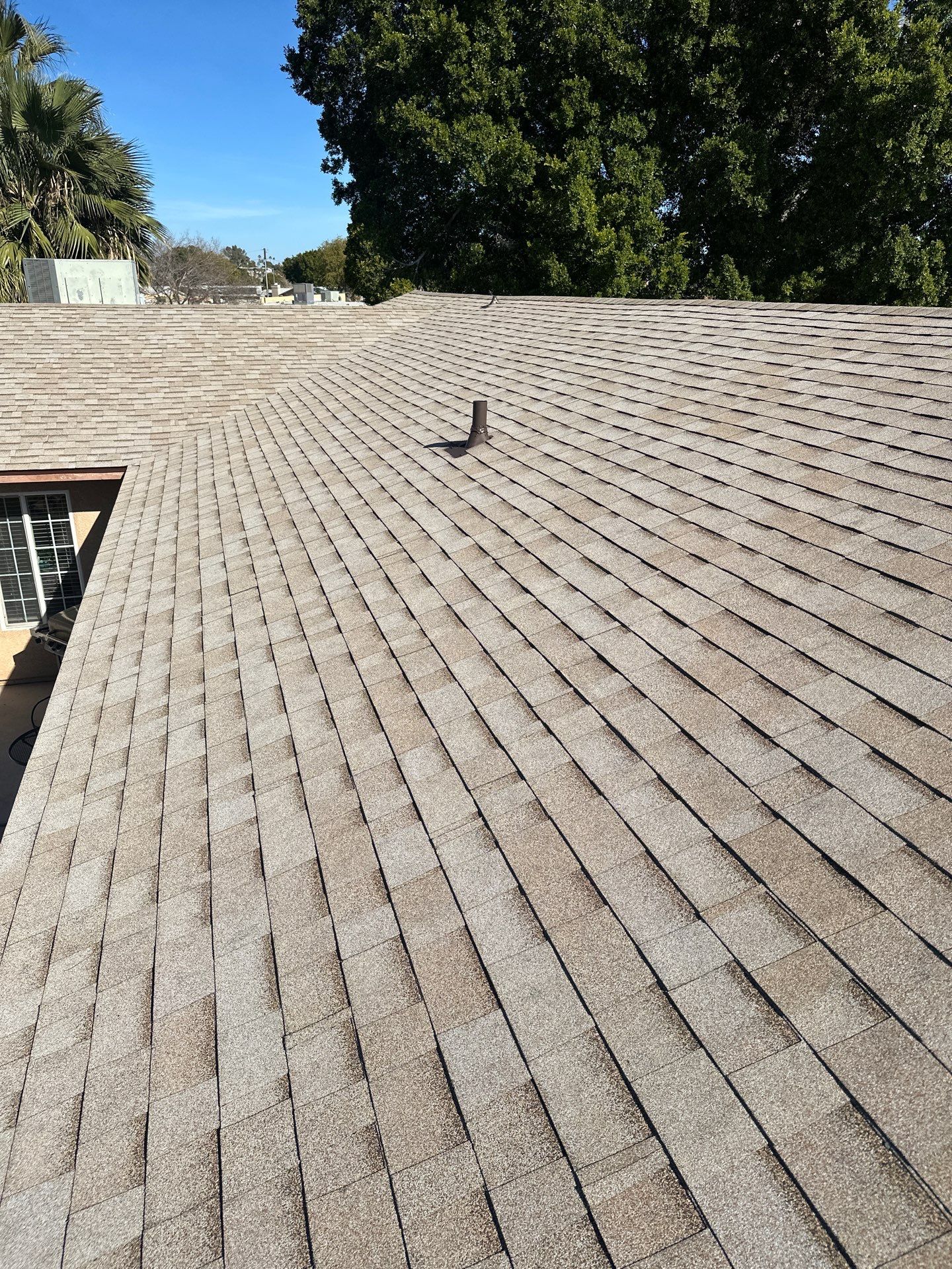 Desert Tan Shingles by Reimagine Roofing